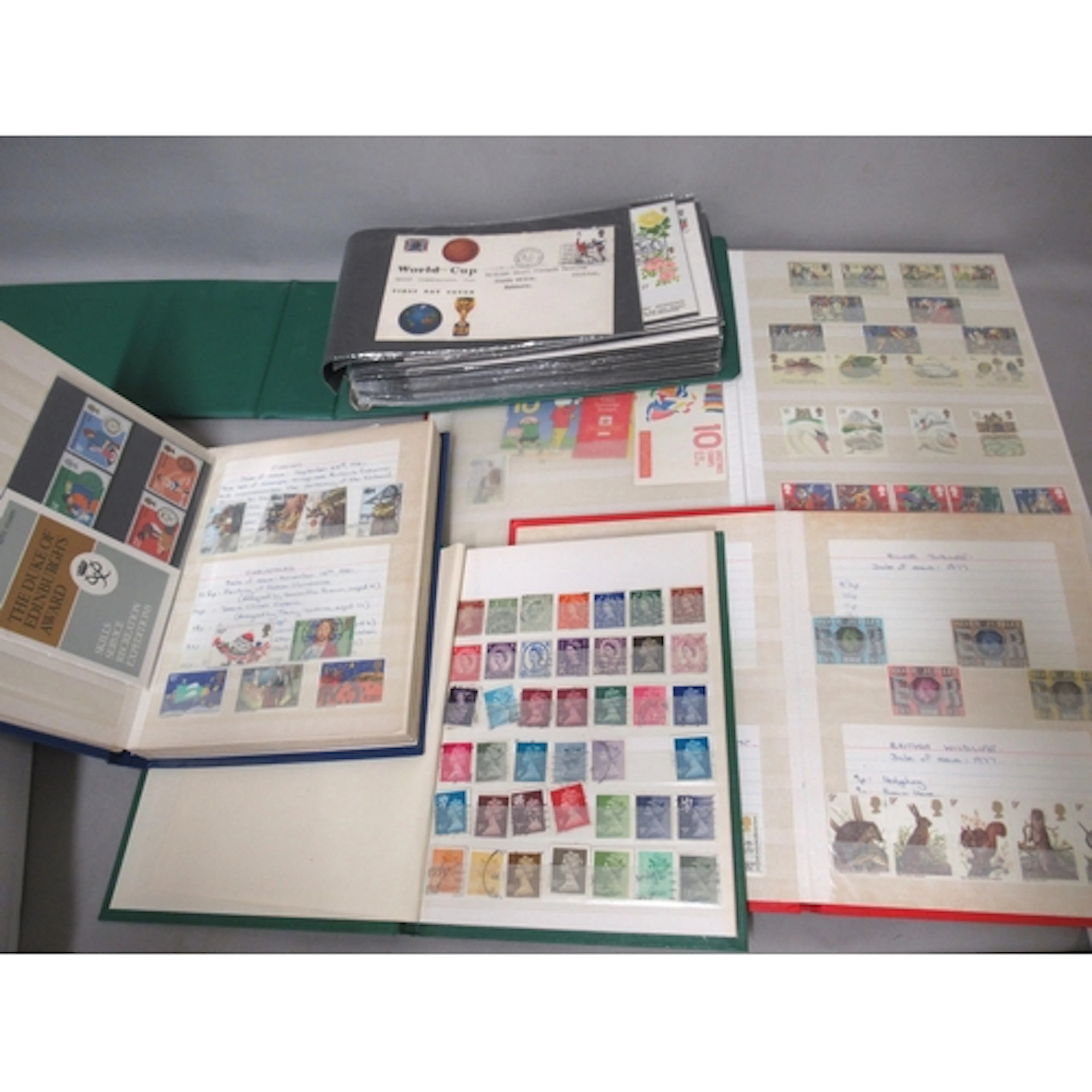 Five albums and stock books, containing a small quantity of ...