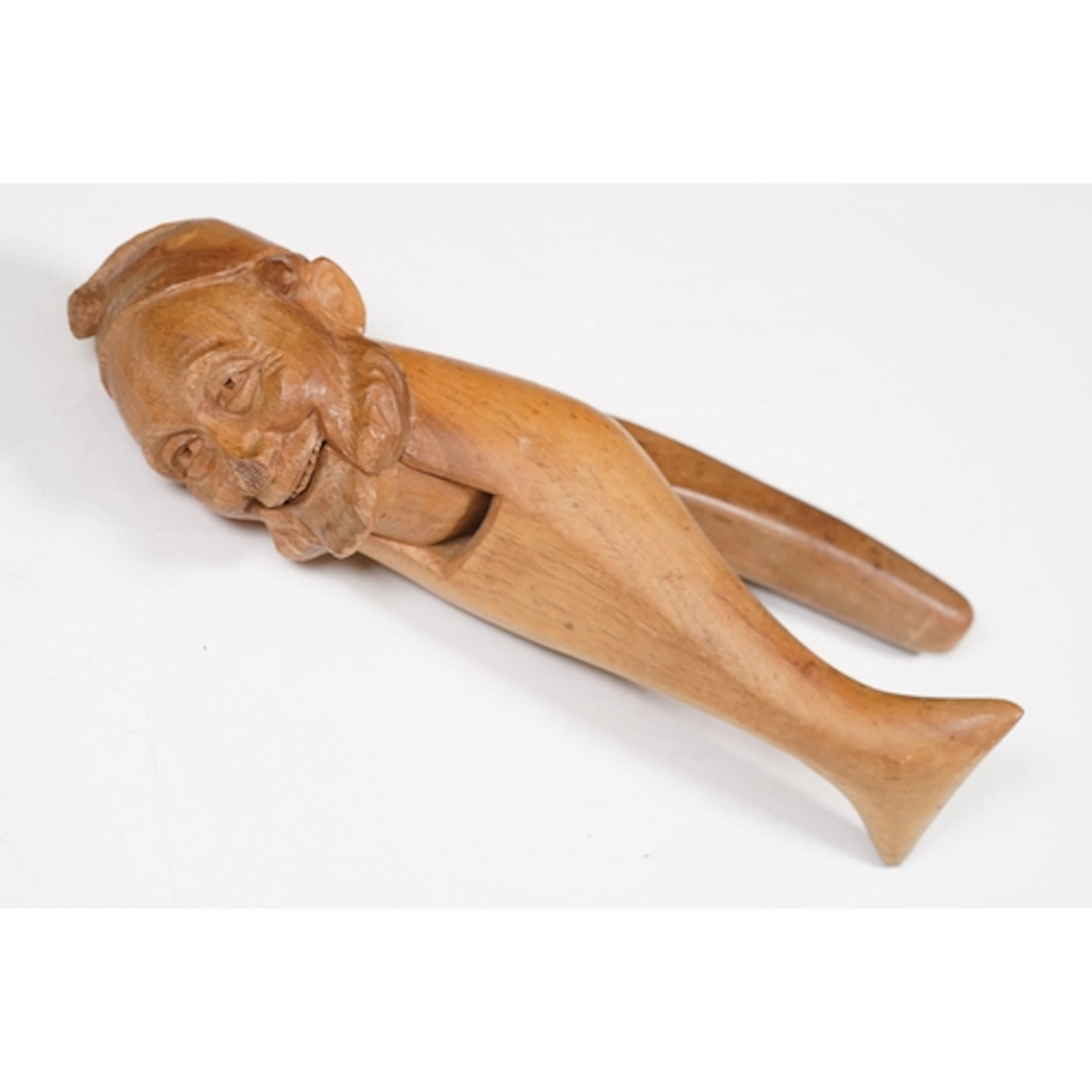 Black Forest style carved wooden nutcracker, of figural form...