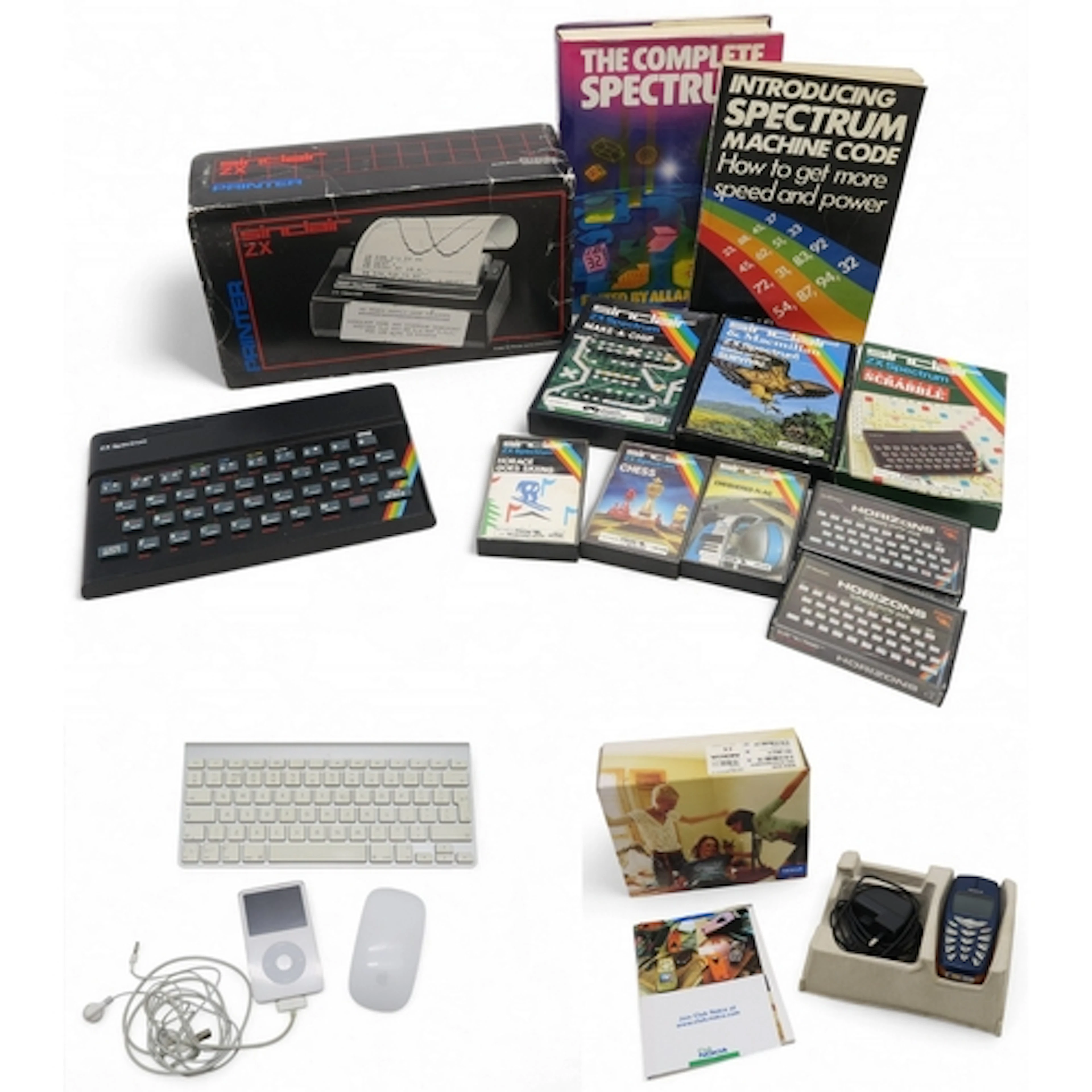 A Sinclair ZX Spectrum console and boxed printer, with assor...