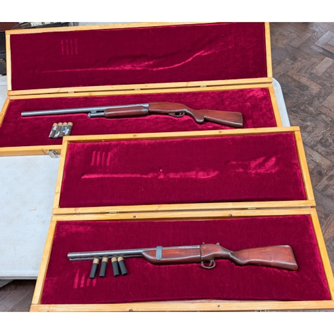 Two cased hand made children's model wooden shotguns and car...