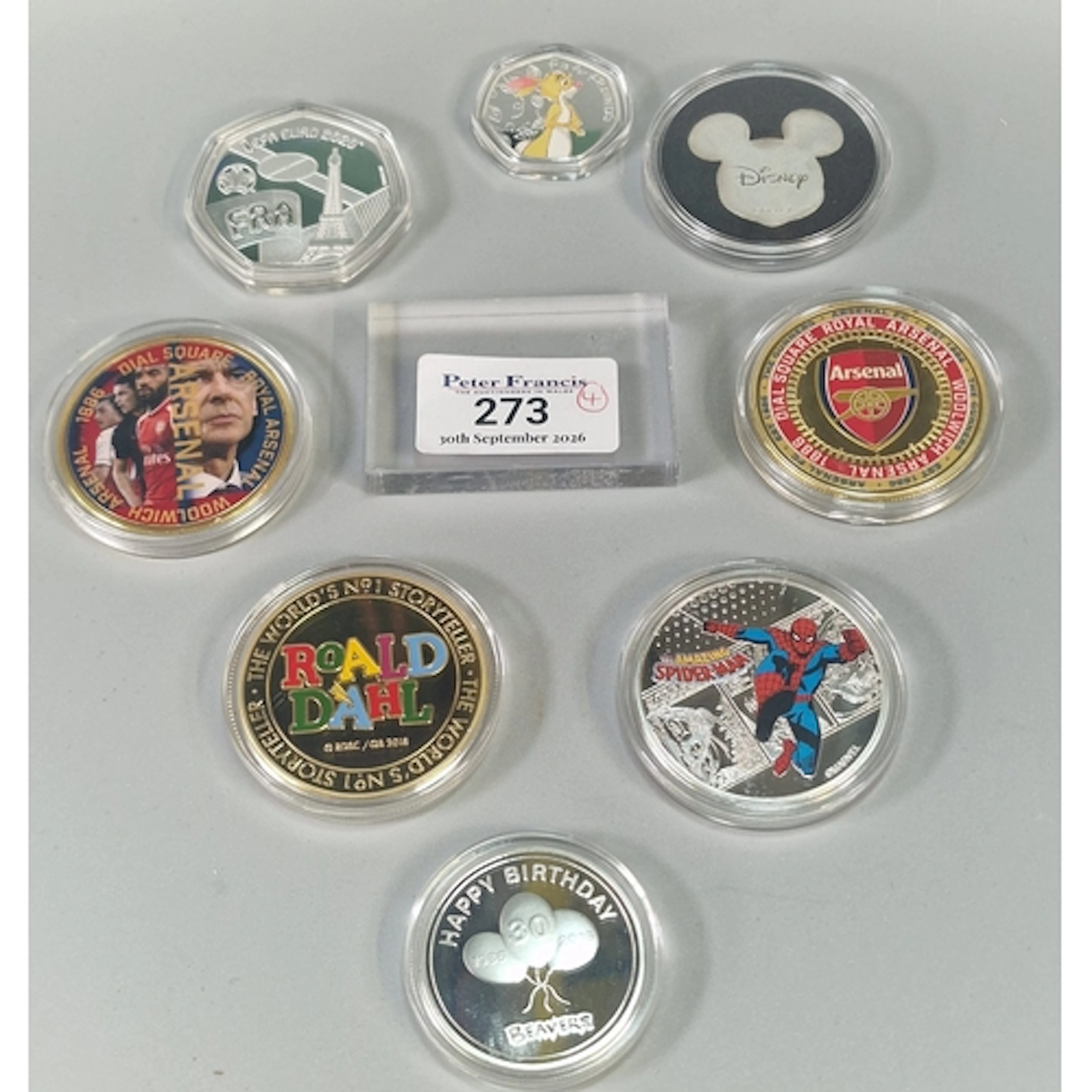 Collection of various novelty coinage to include: Marvel com...