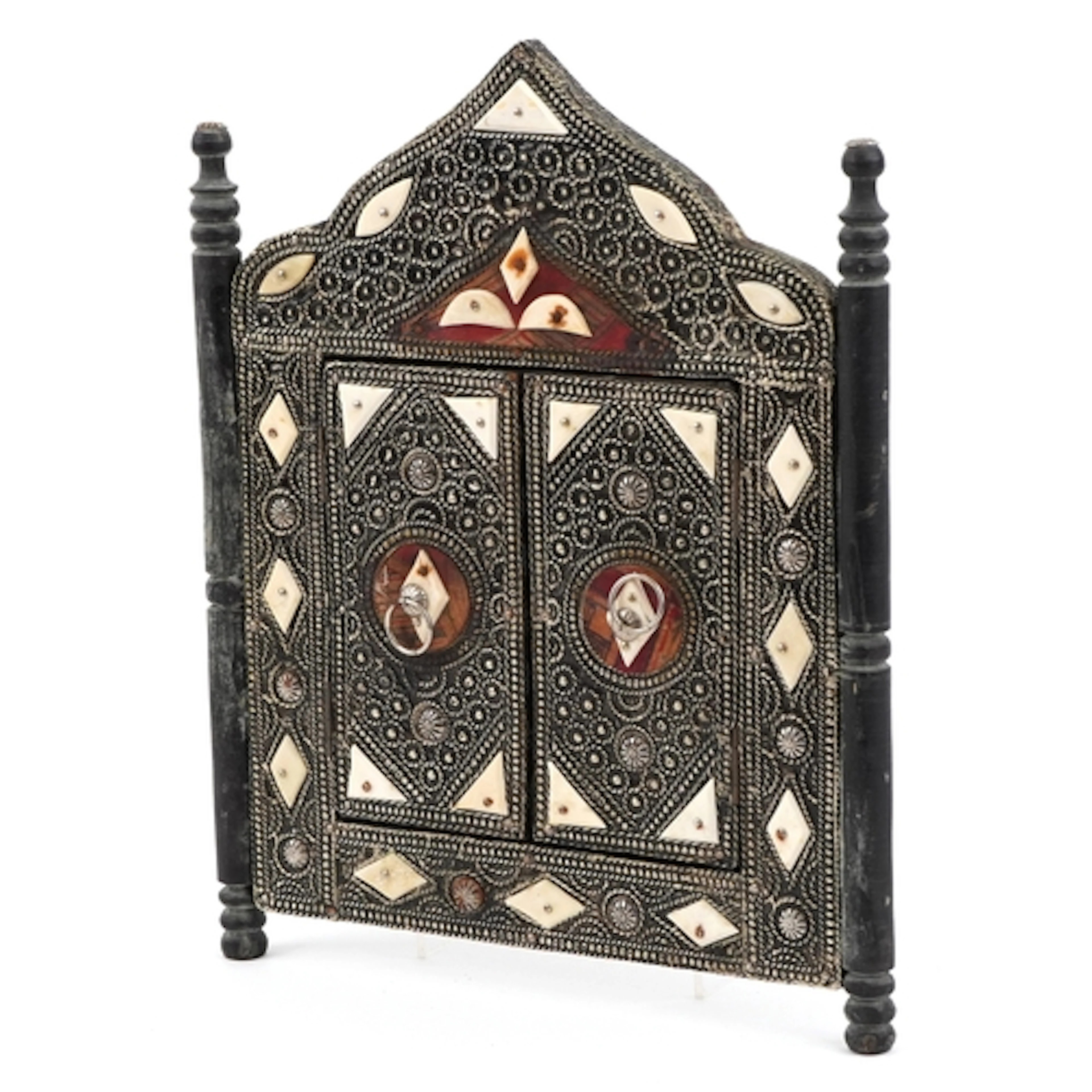 Moroccan carved wood wall mirror with bone inlay, 32cm high.