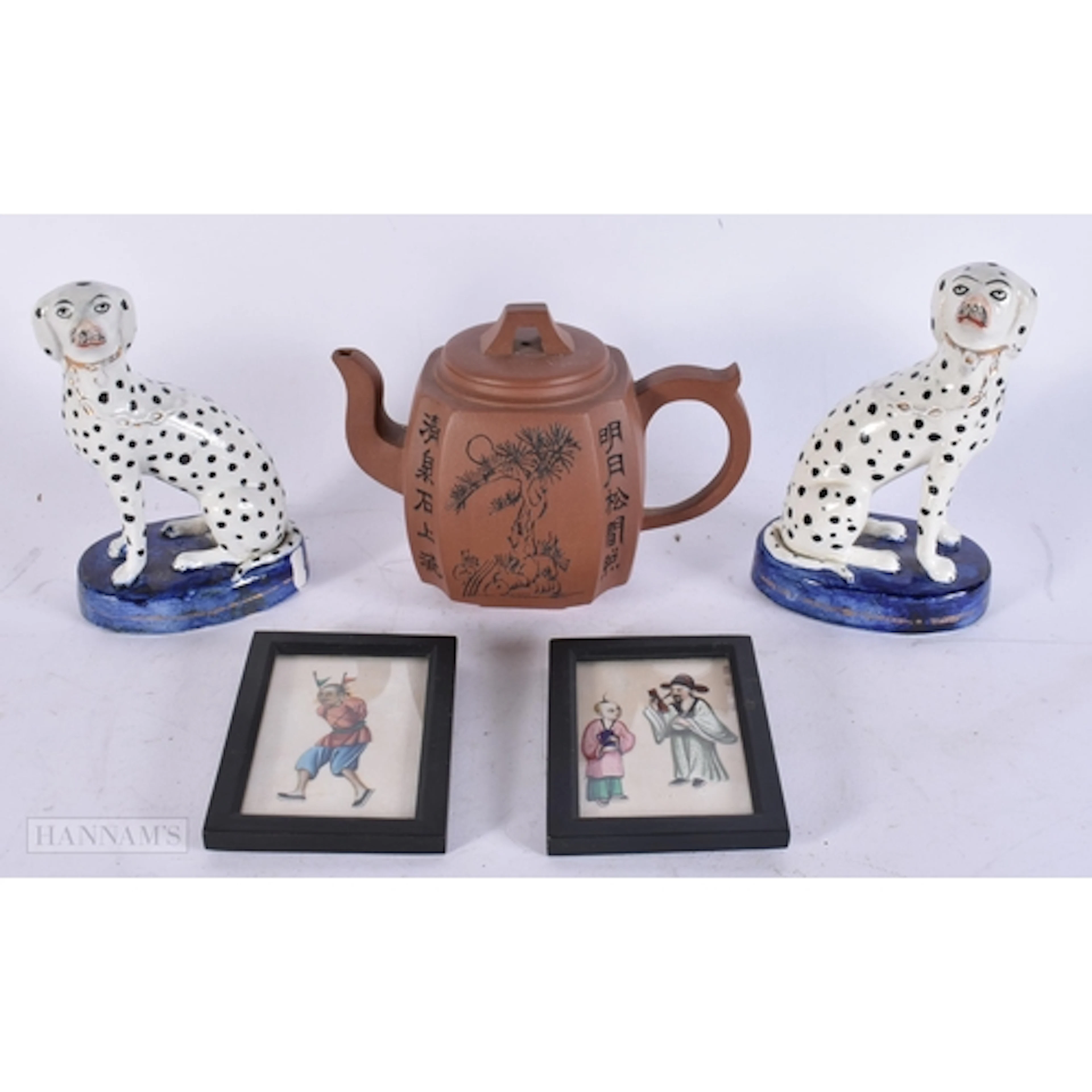 A CHINESE YIXING POTTERY TEAPOT together with a pair of pith...