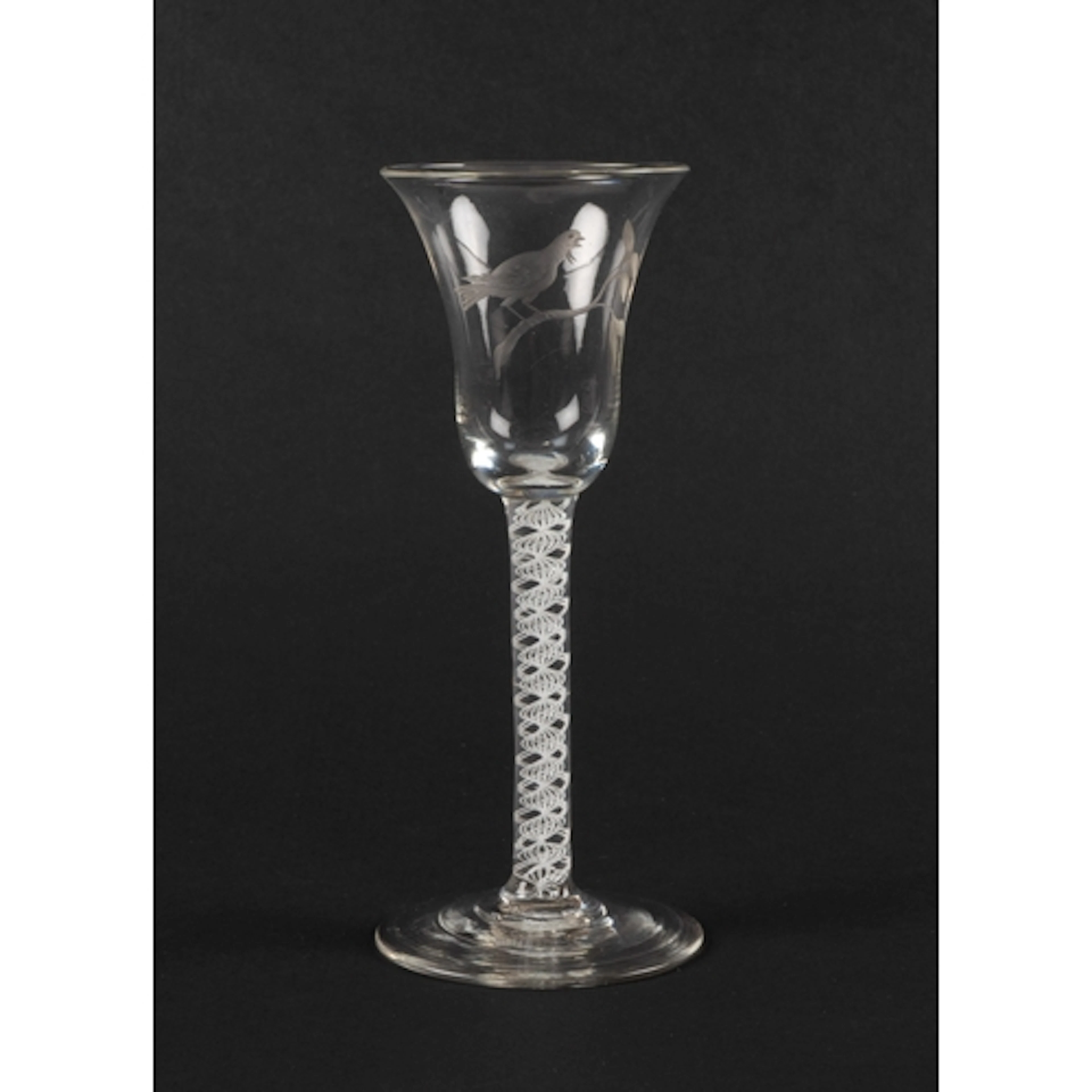 An unusual engraved wine glass, c.1760, the bell bowl engrav...
