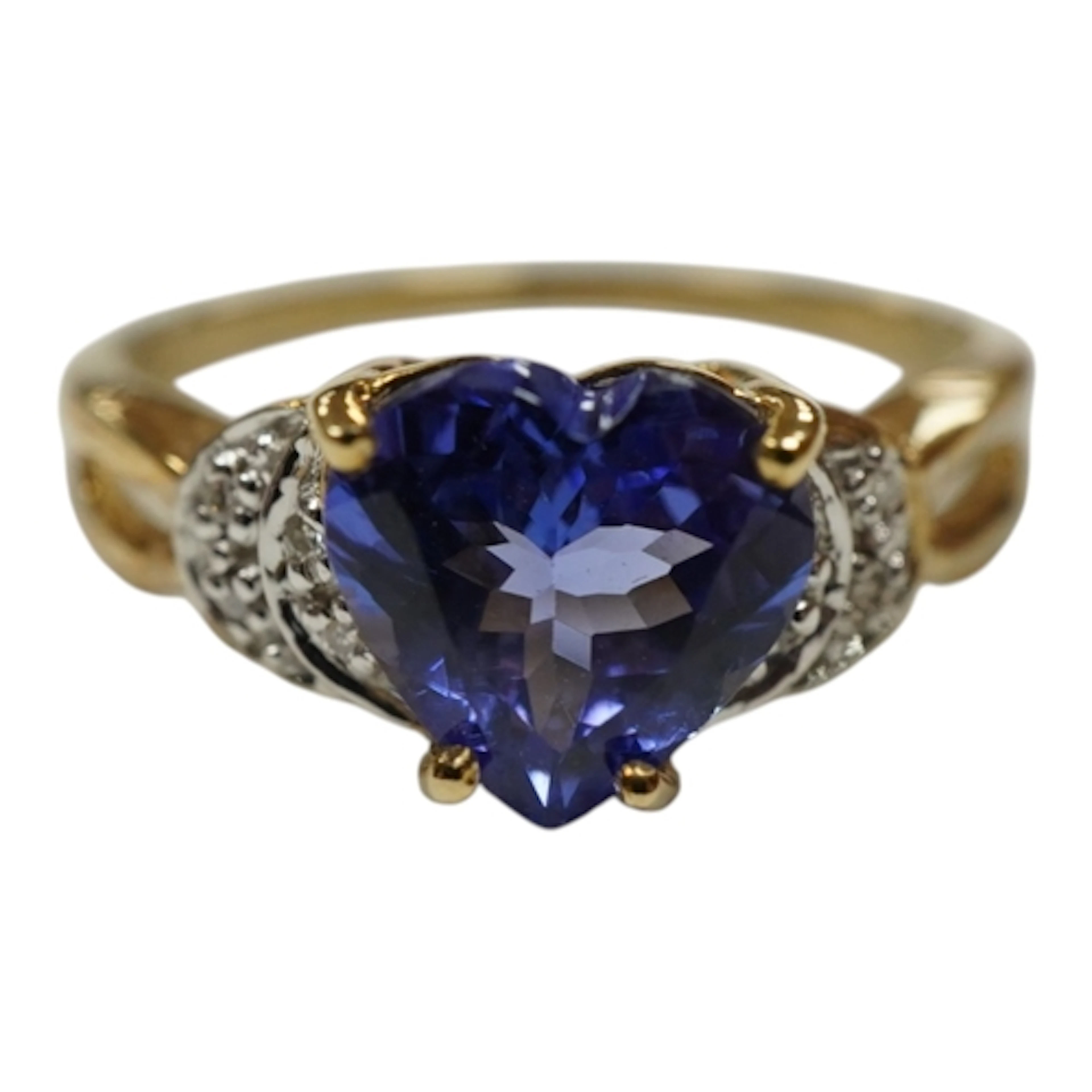 A recent 9ct gold and single stone heart shaped tanzanite ri...