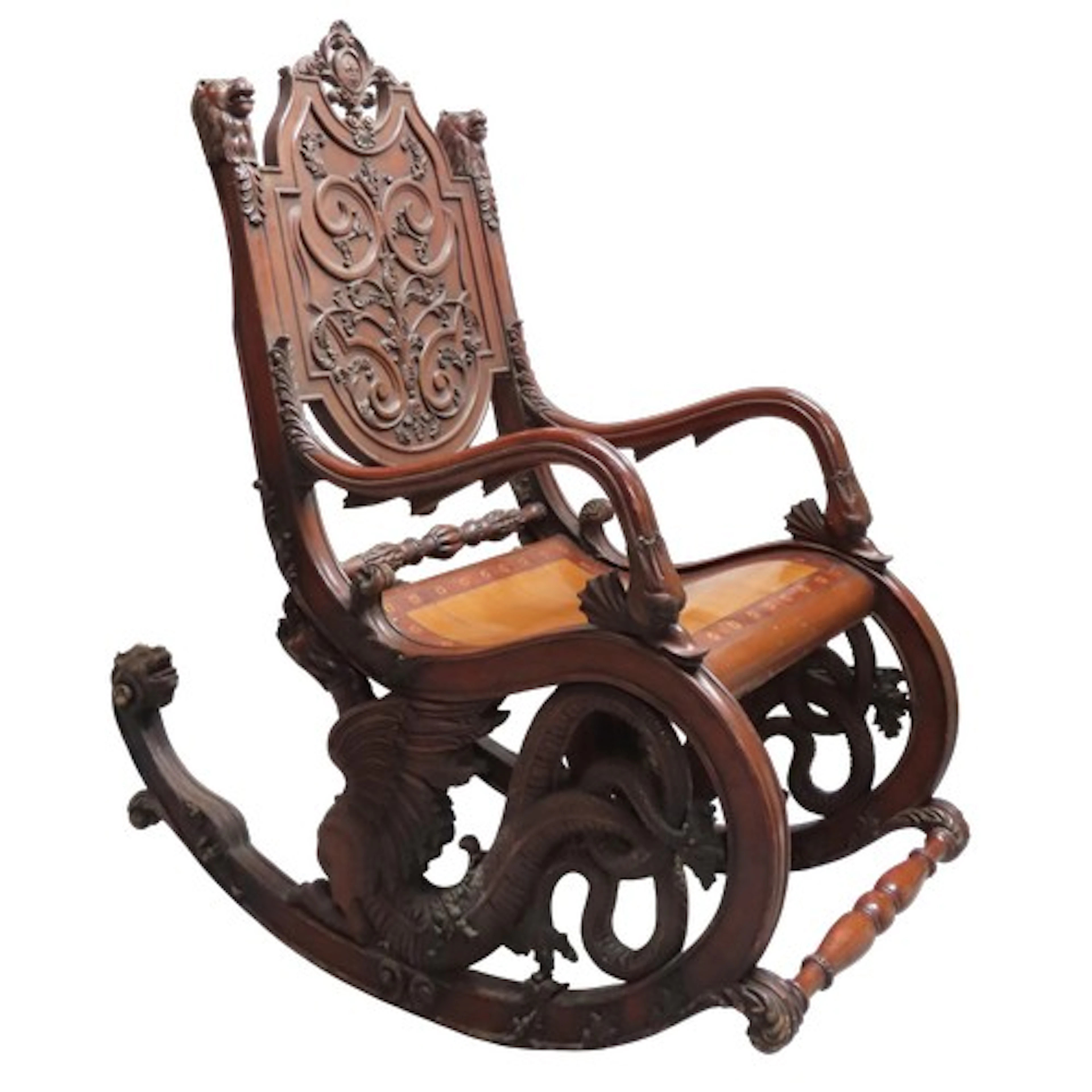 AN IMPRESSIVE CONTINENTAL CARVED AND INLAID ROCKING CHAIR LA...