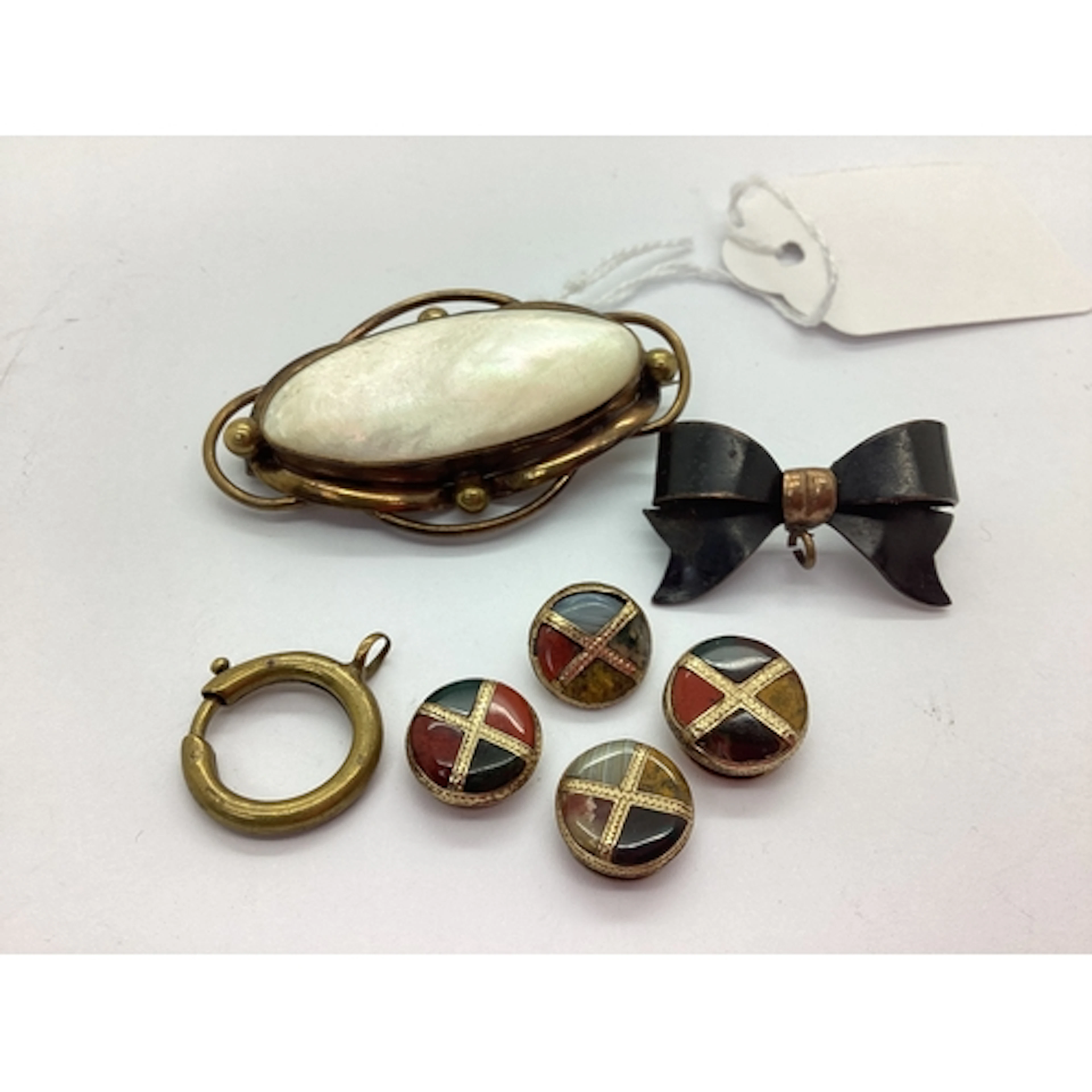 An Antique Oval Mother of Pearl Brooch, the panel cabochon s...