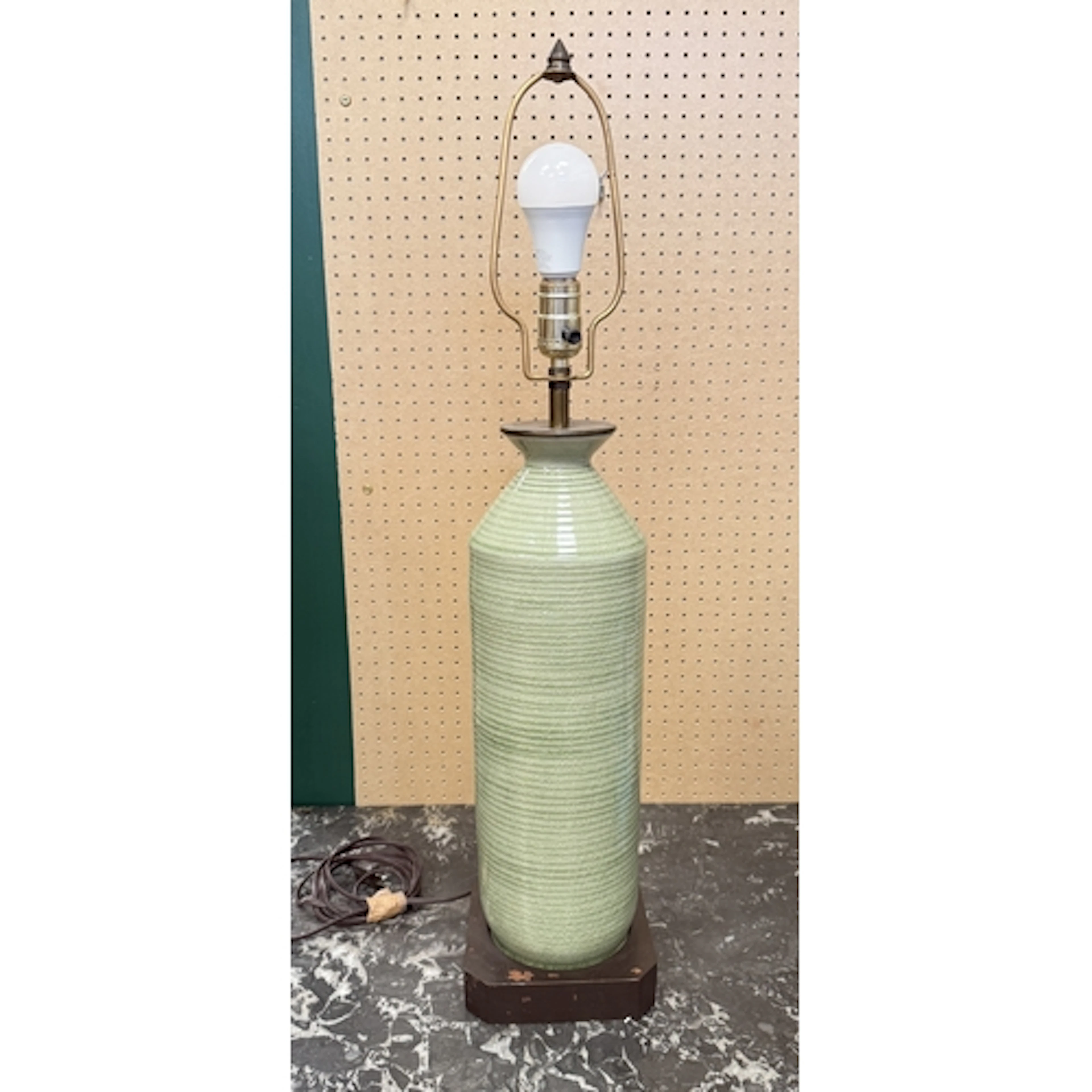A SOUTH EAST ASIAN CELADON GLAZED CERAMIC LAMP, POSSIBLY THA...