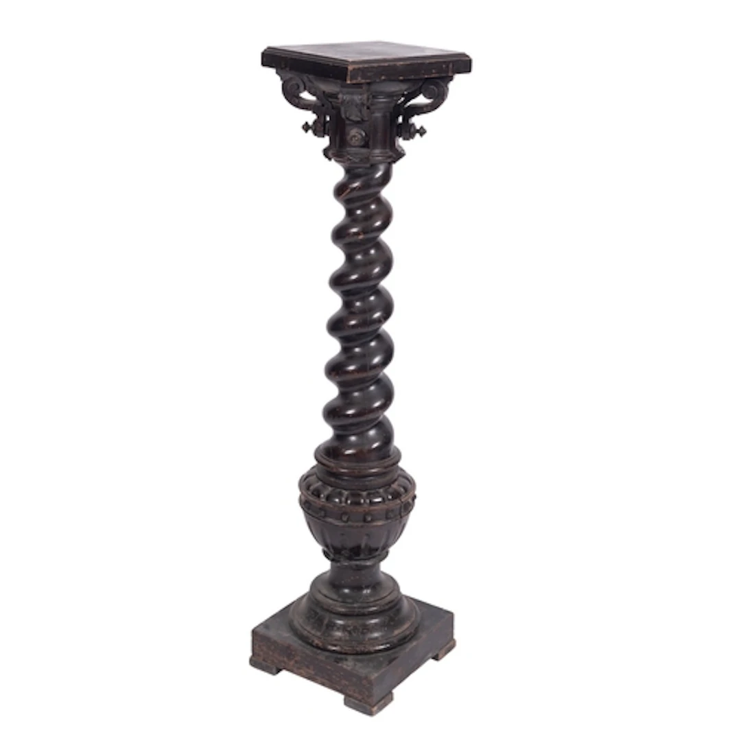 A Victorian carved and ebonised wood columnar pedestal, last...