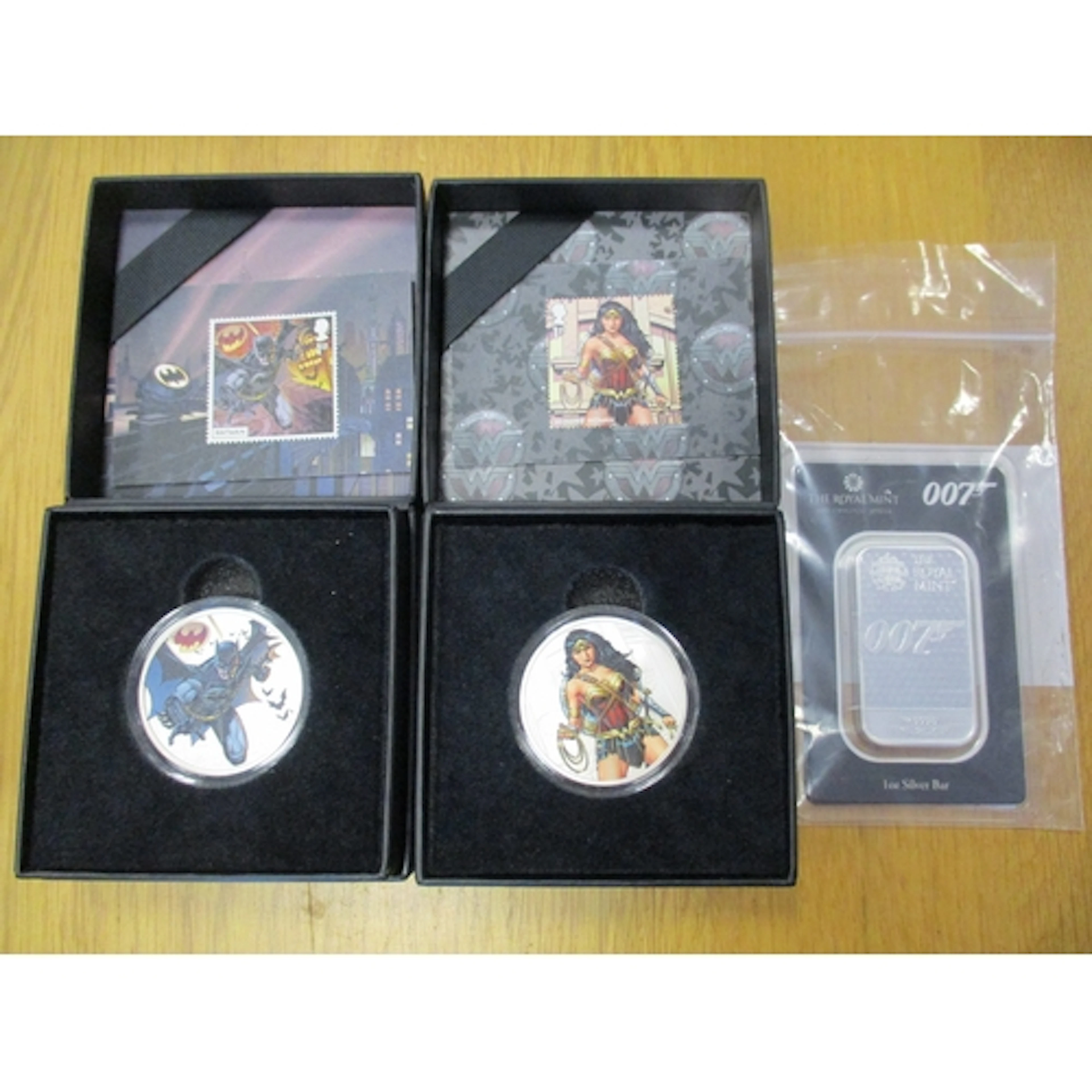 Collection with 2021 Batman and Wonder Woman boxed silver pr...