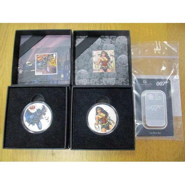 Collection with 2021 Batman and Wonder Woman boxed silver pr...