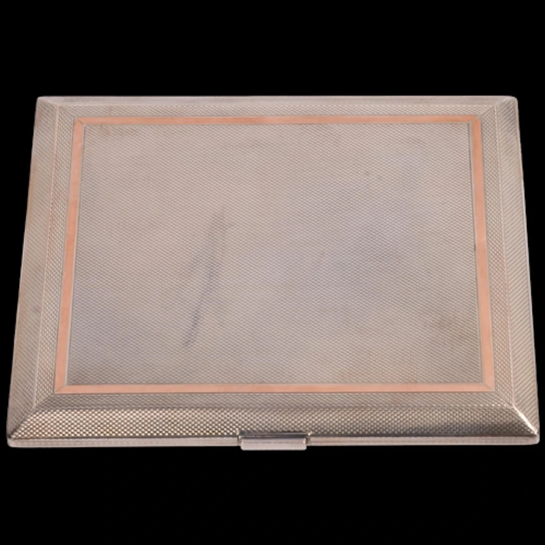 ALFRED DUNHILL - a large Art Deco style Elizabeth II silver ...