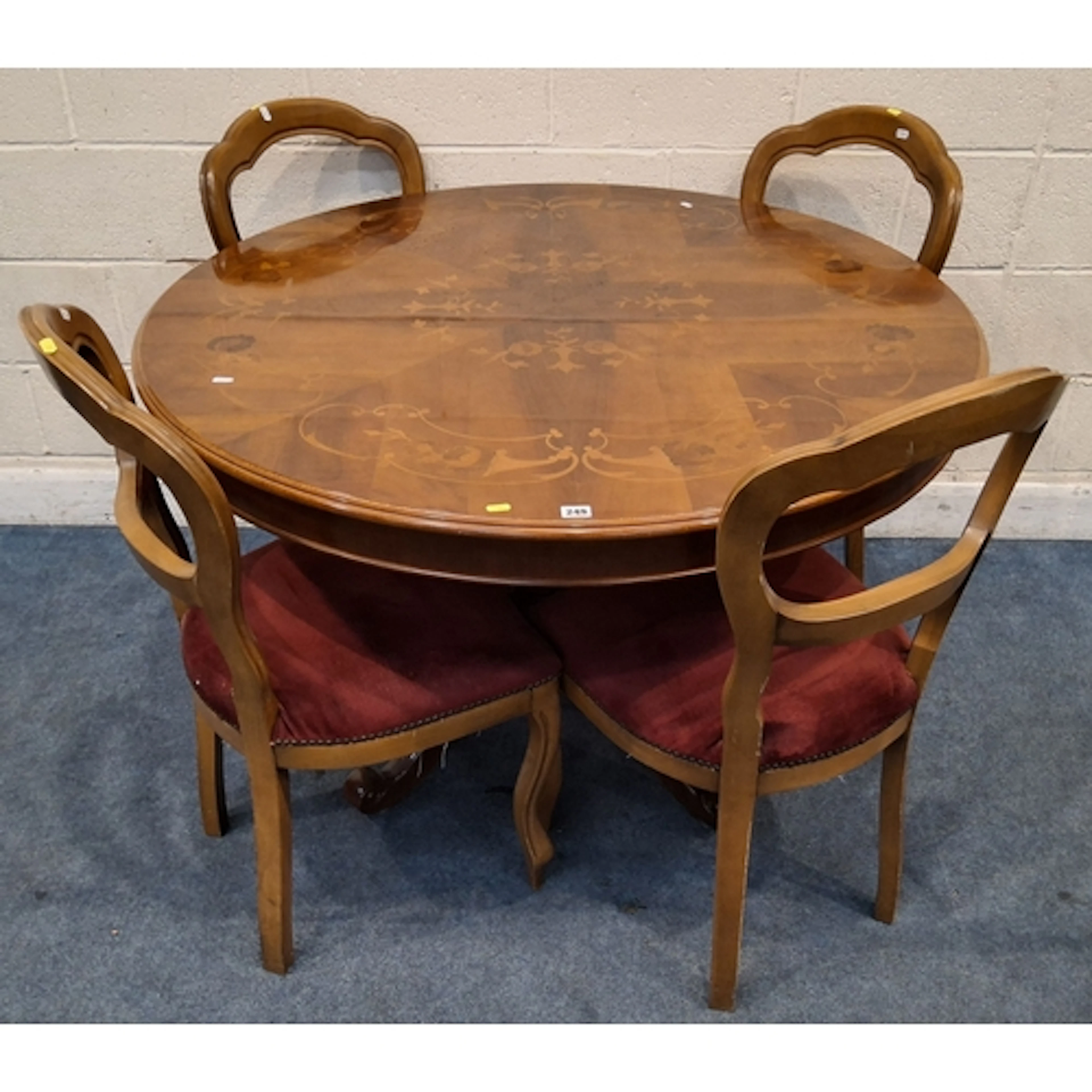 A REPRODUCTION ITALIAN CIRCULAR TABLE, raised on a single pe...