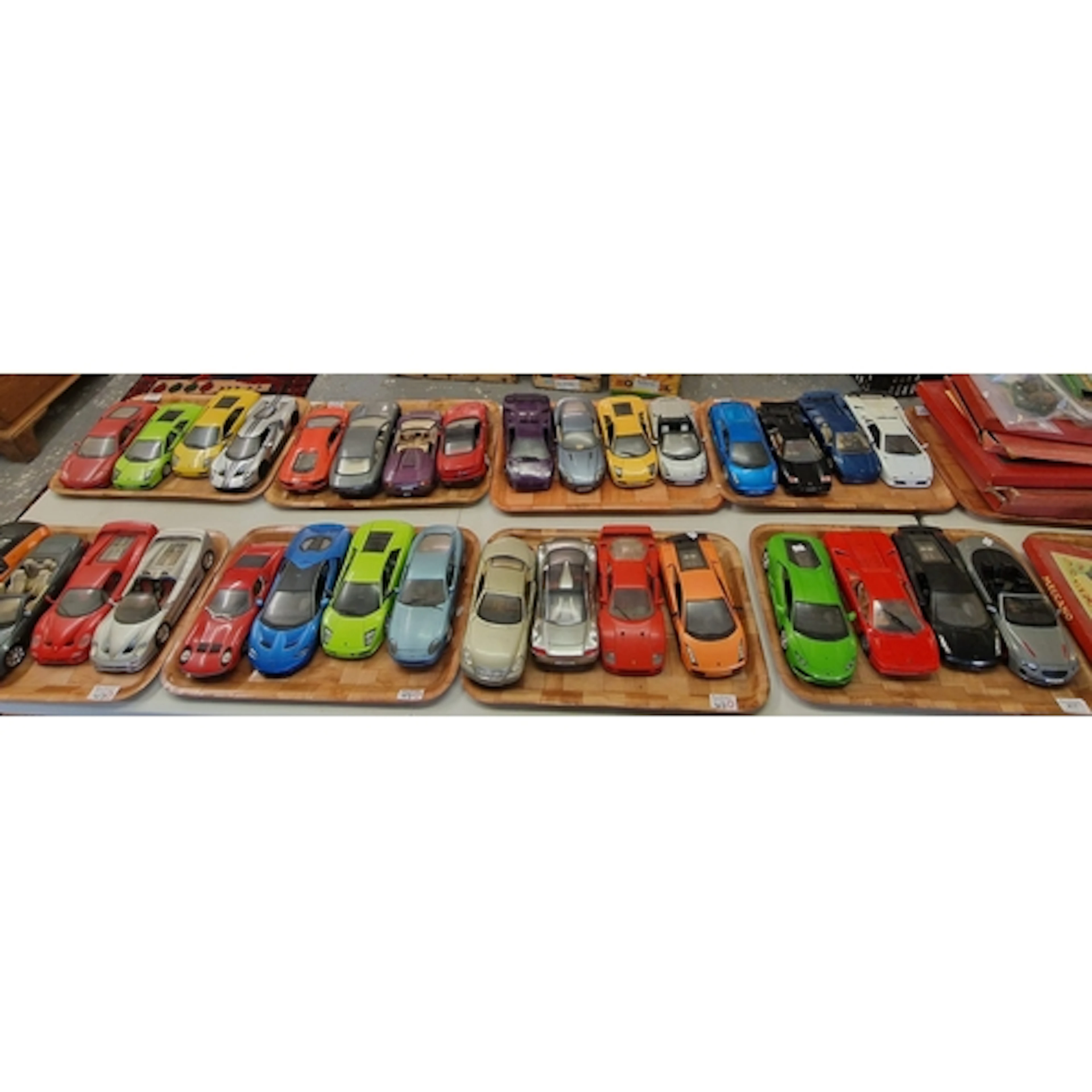 Eight trays of Maisto, Burago and other model sports cars. (...