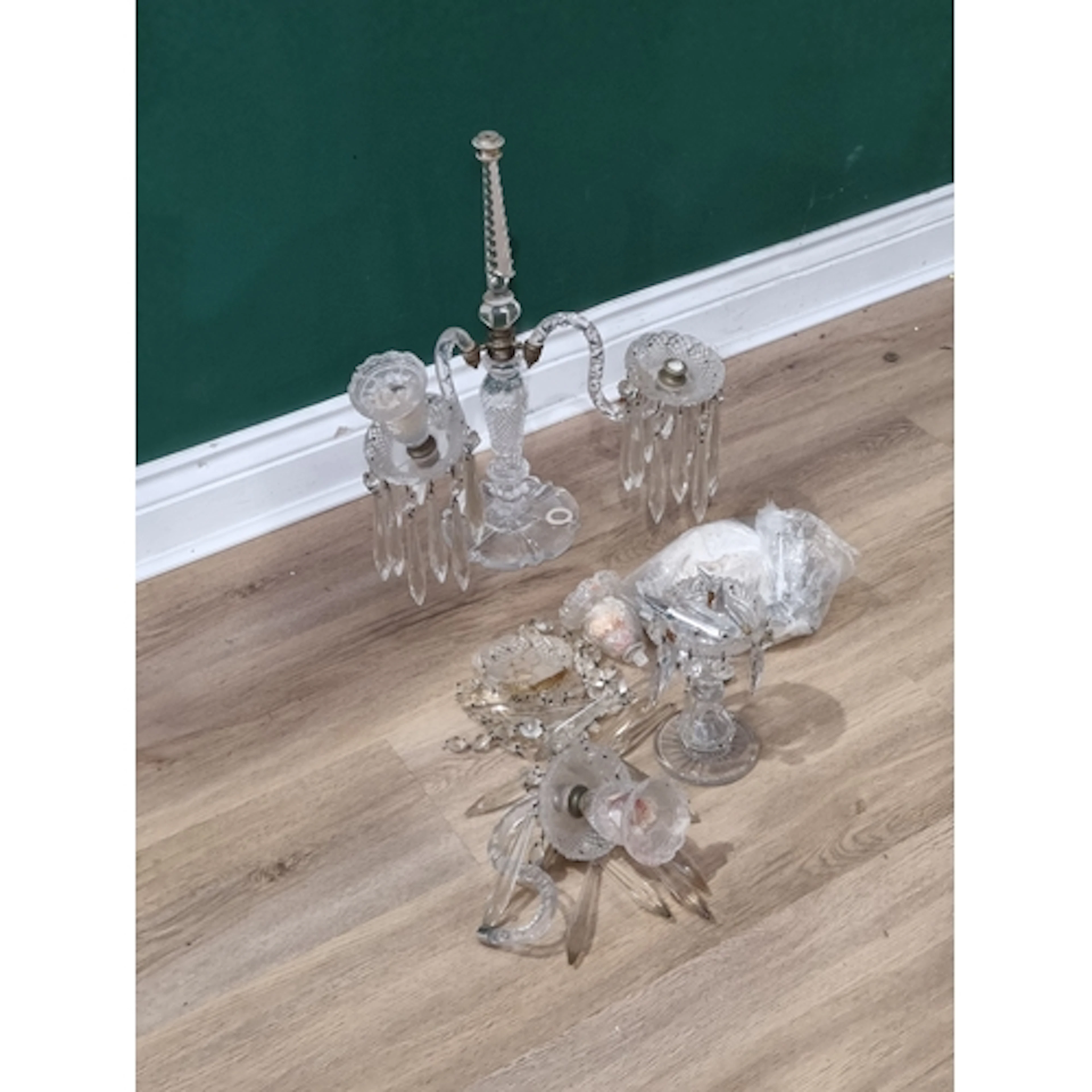A cut glass three branch Candelabra with pendant drops, a si...