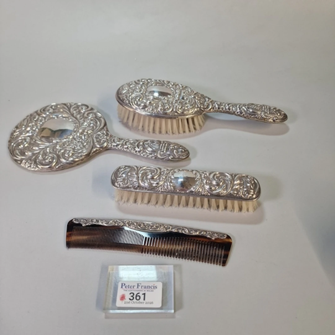 Art Nouveau silver repoussé four piece lady’s dressing table...