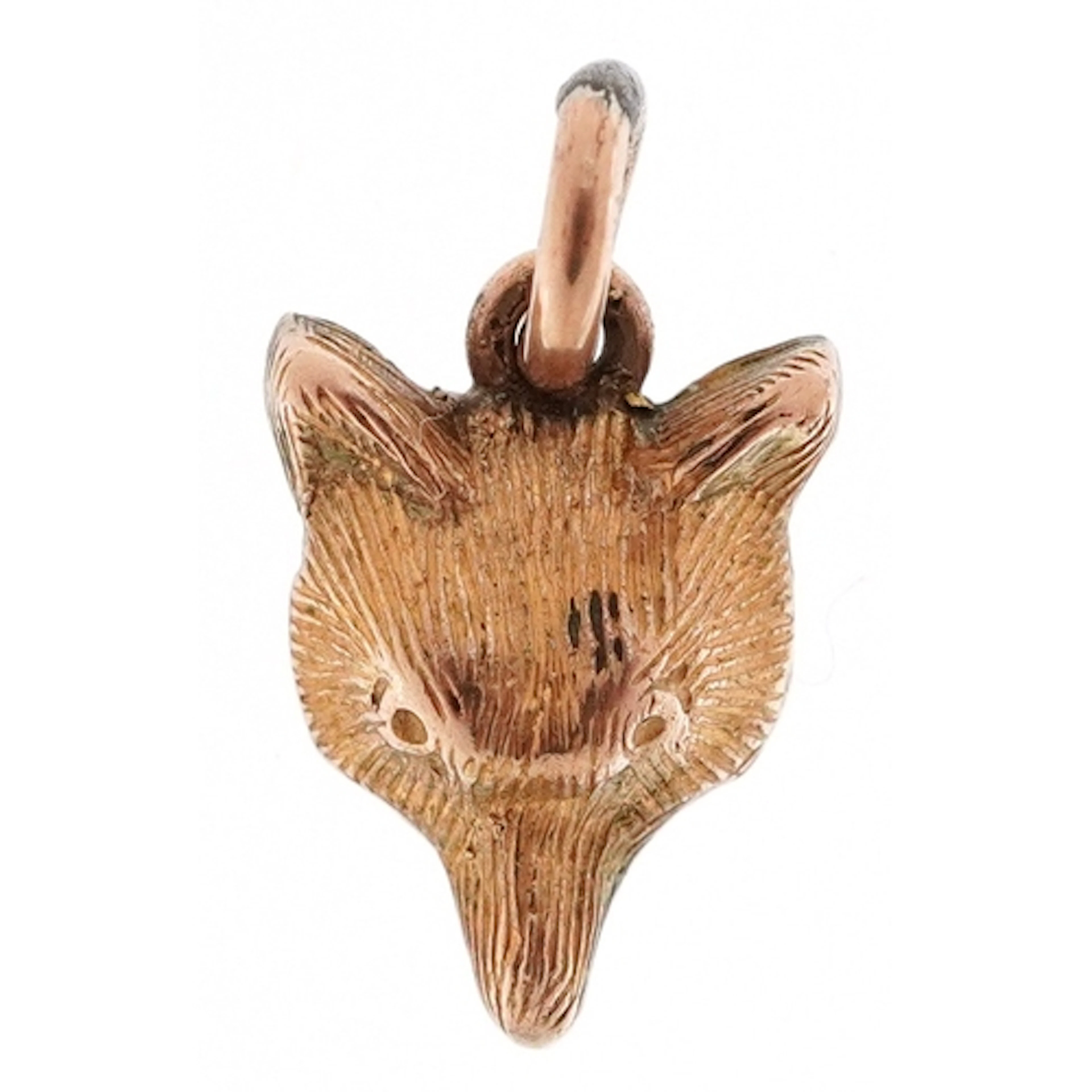 Unmarked gold charm in the form of a fox head, 10.0mm high, ...