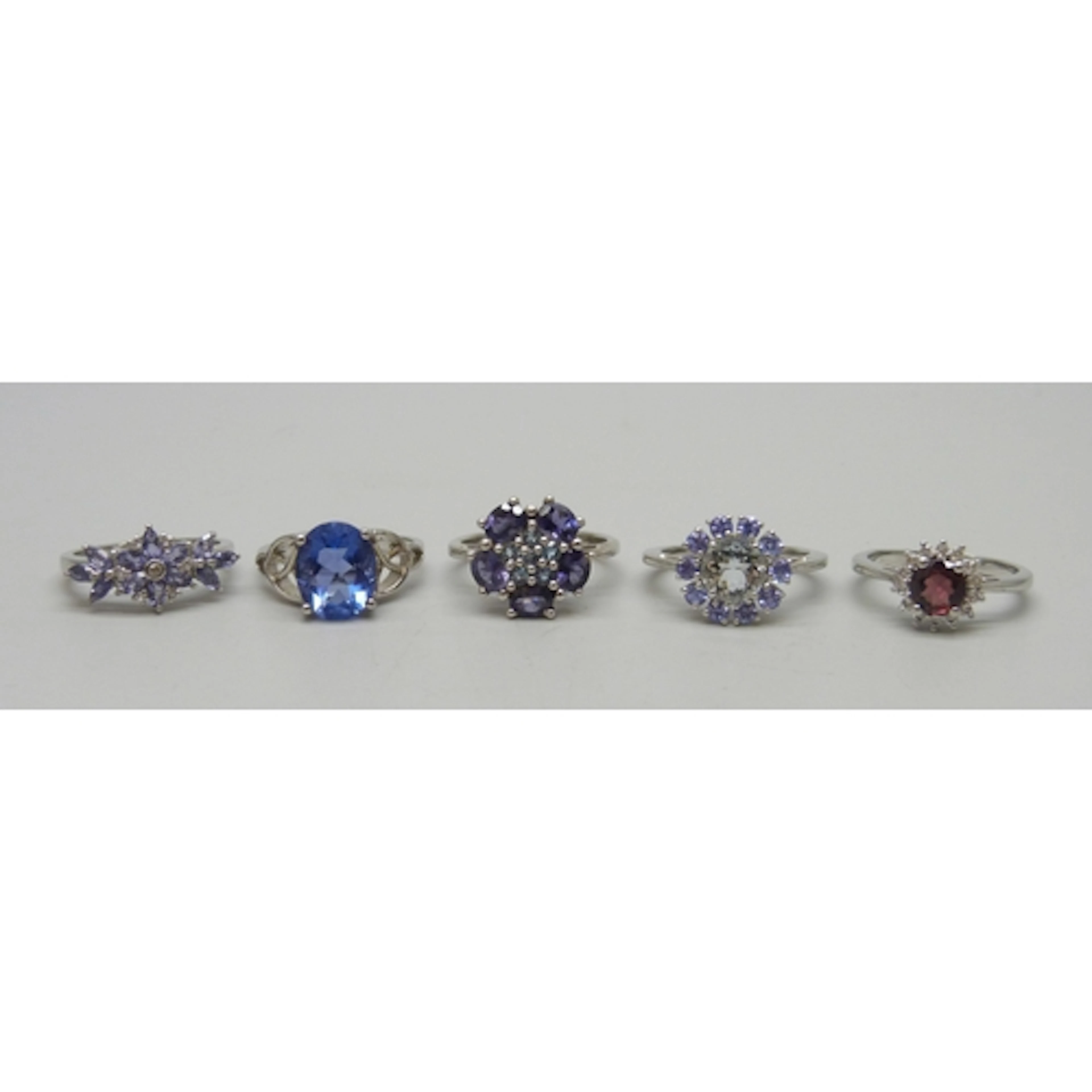 A collection of five TGGC and other gemstone rings, 15g tota...