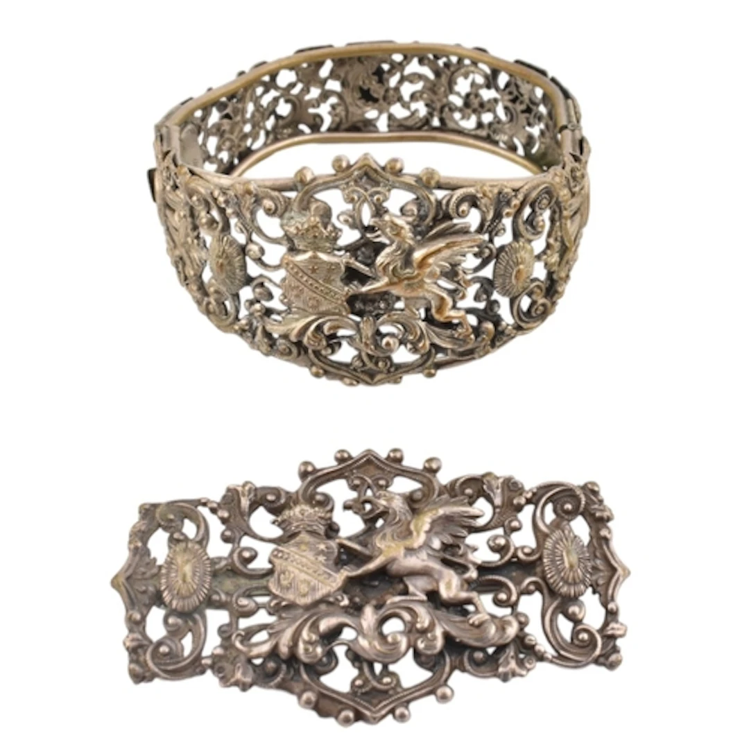 A white metal Austro-Hungarian style cuff bracelet and brooc...
