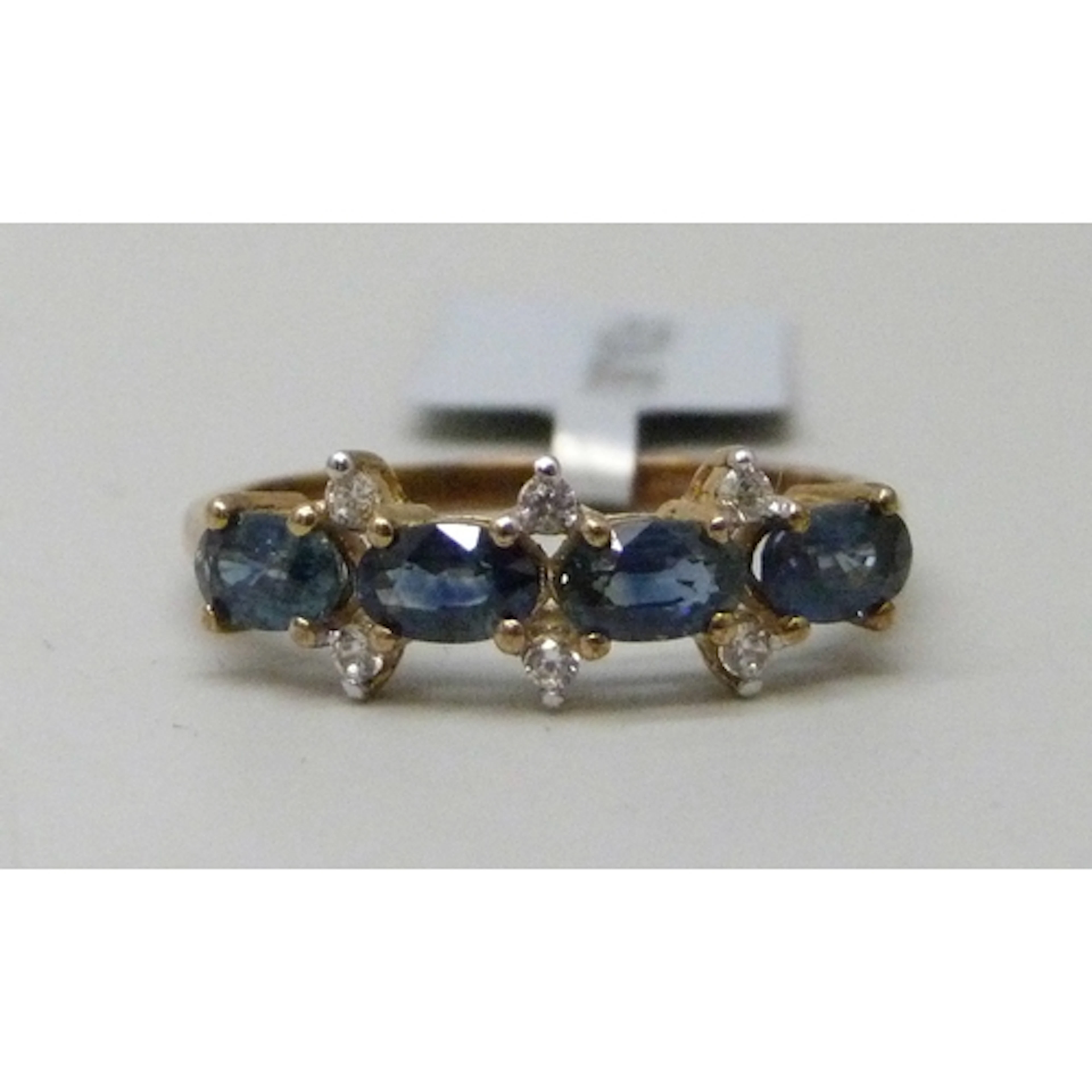 A Gemporia 9ct gold, sapphire and white stone cluster ring, ...