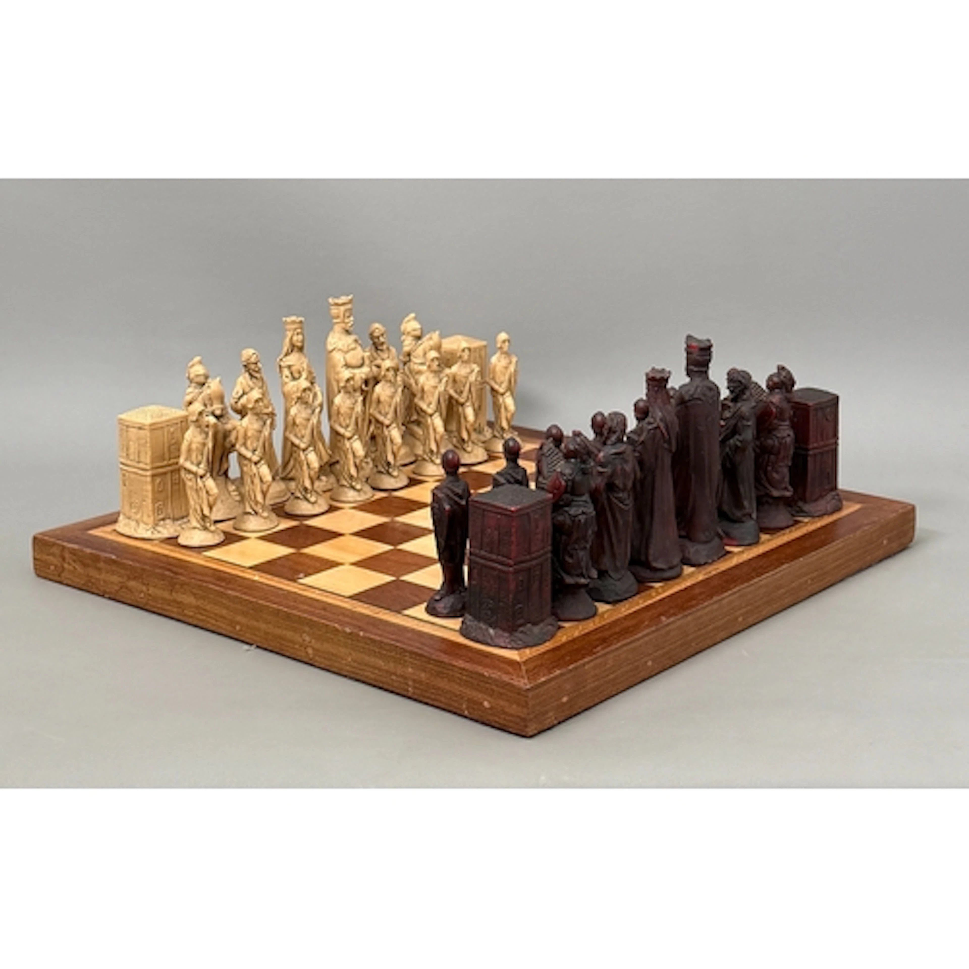 A resin King Arthur large-size chess set with board - the co...