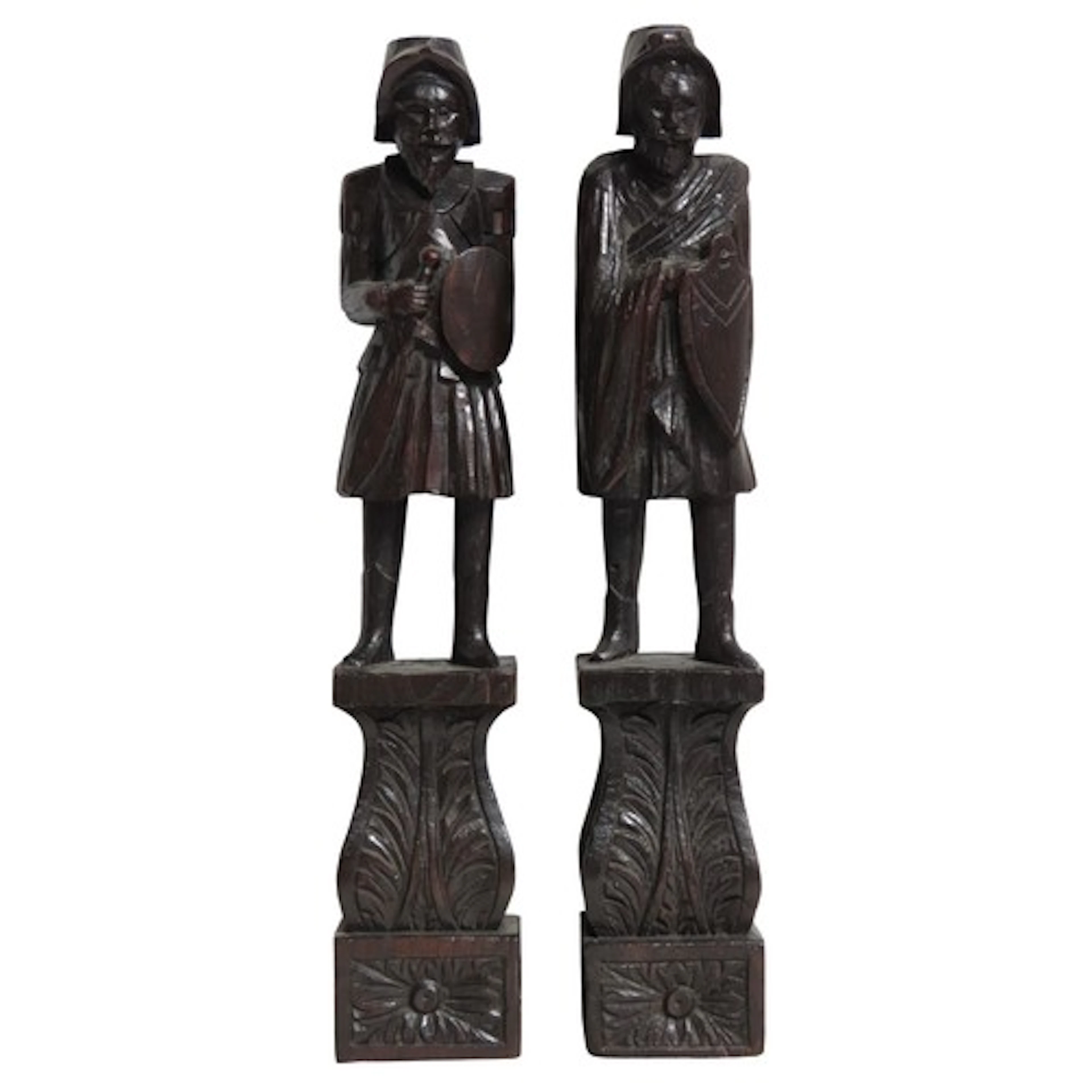 A PAIR OF CARVED OAK FIGURAL CORBELS 18TH CENTURY depicting ...