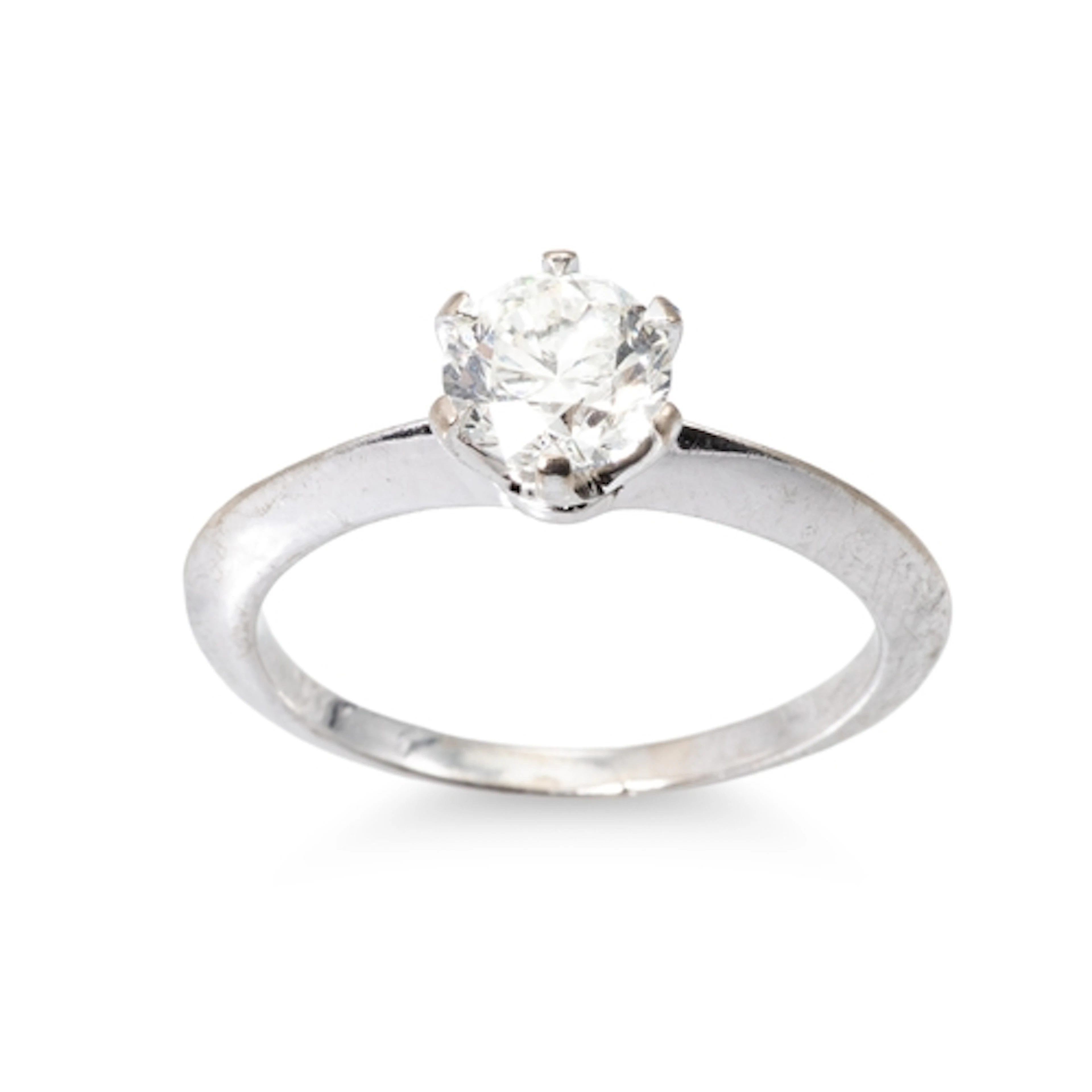 A DIAMOND SOLITAIRE RING, mounted in 18ct white gold, with I...