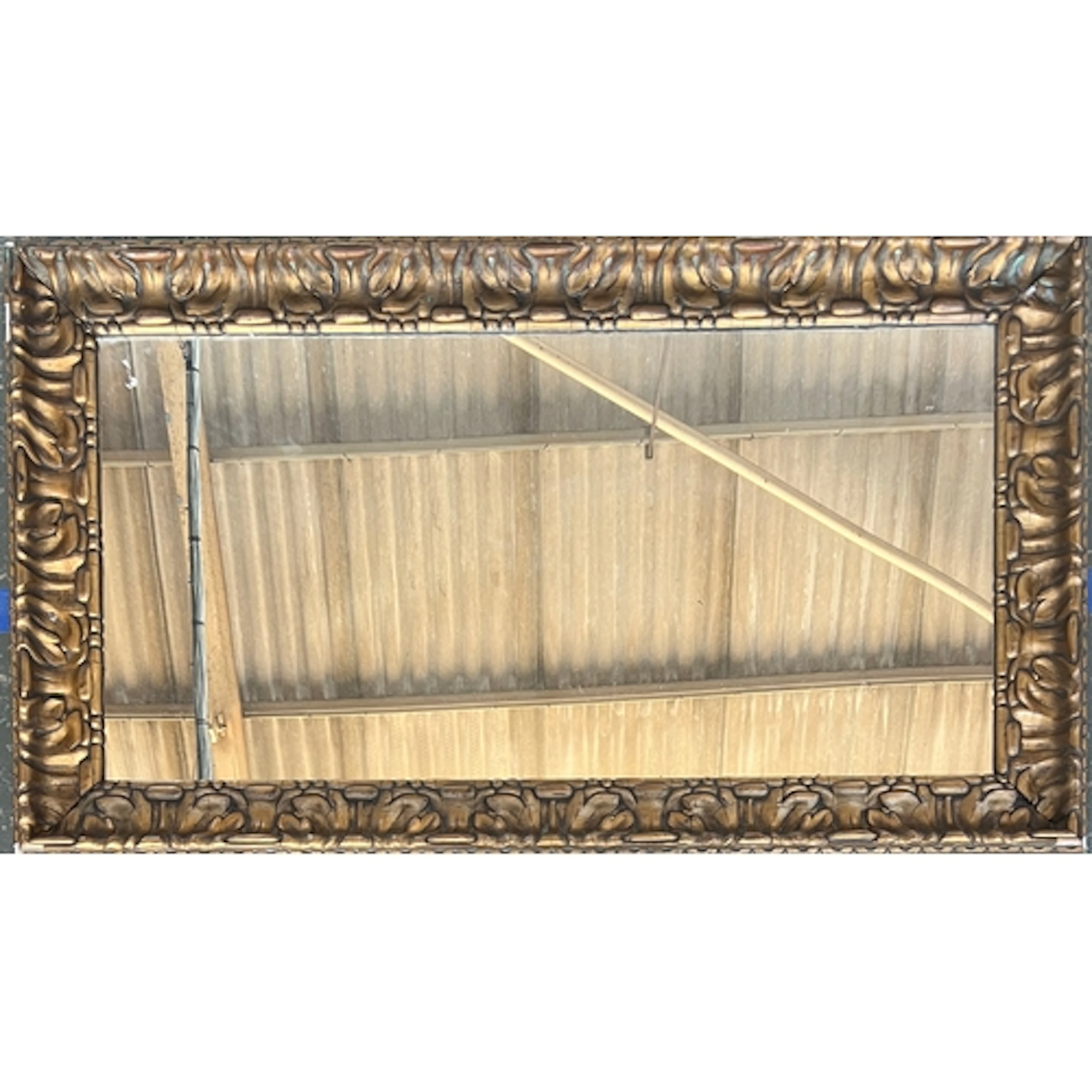 A large rectangular gilt gesso framed mirror, 114x65cm
