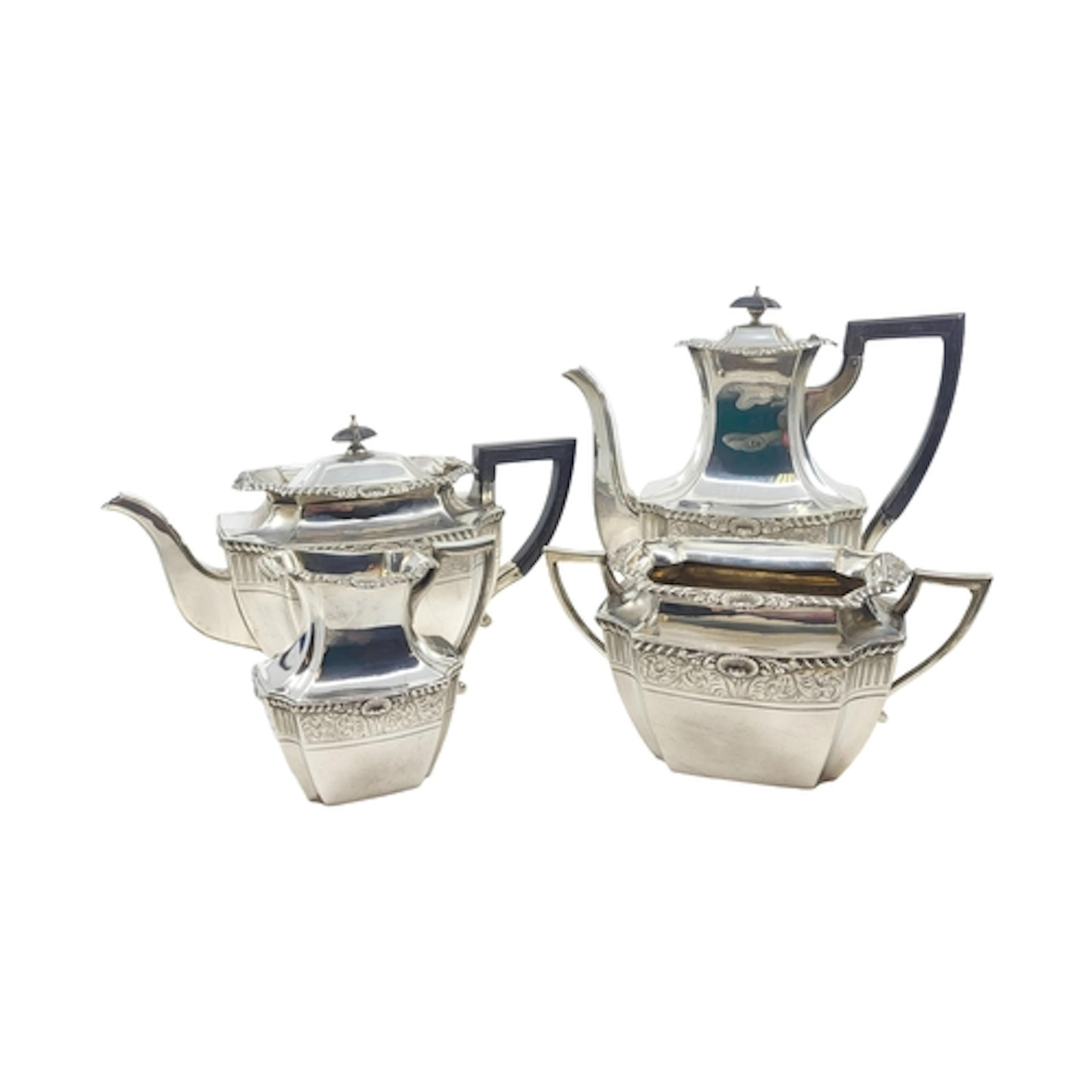 A LATE VICTORIAN ANTIQUE FOUR PIECE SILVER NEO CLASSICAL STY...