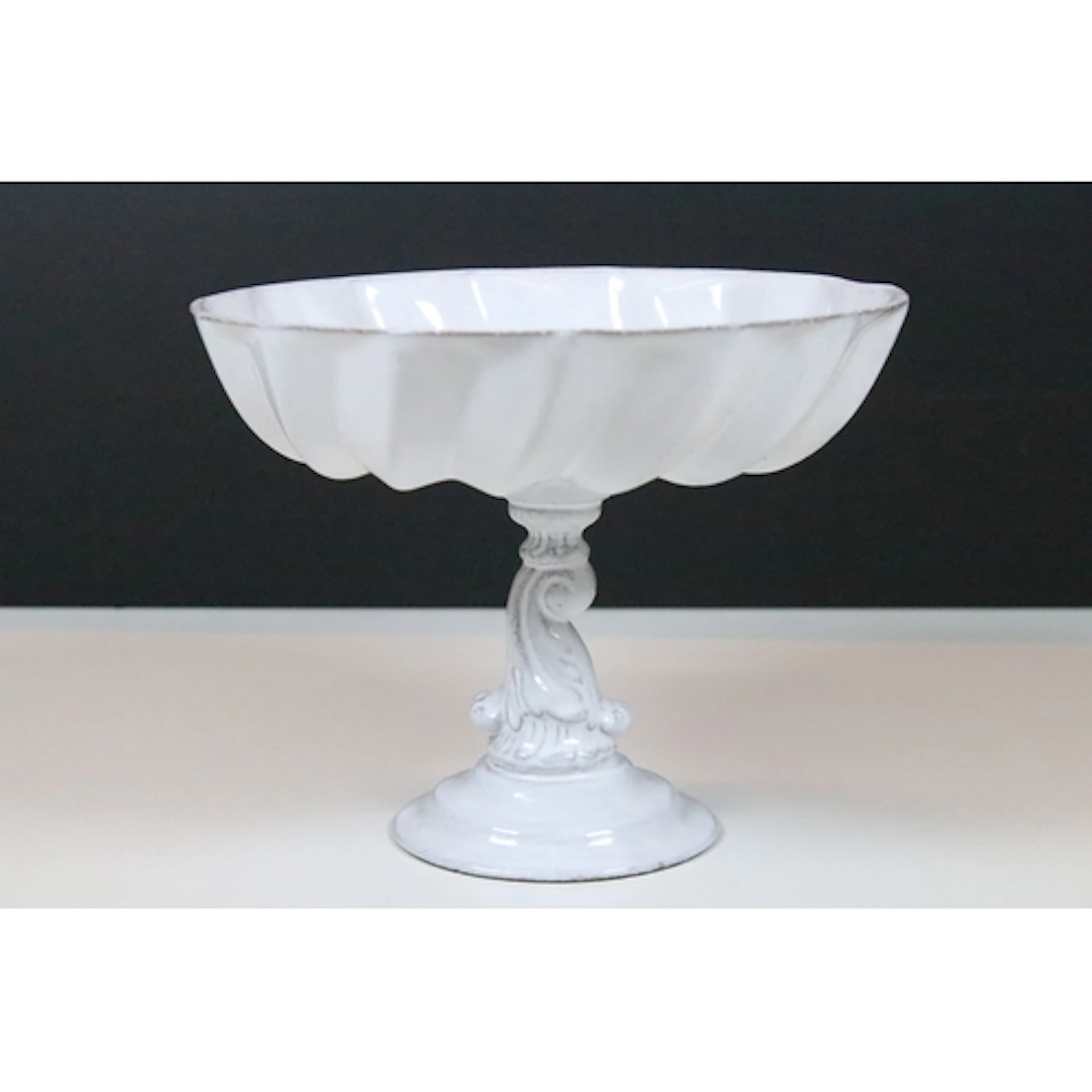Astier de Villatte, Paris 'Tom' stand, having fluted bowl on...