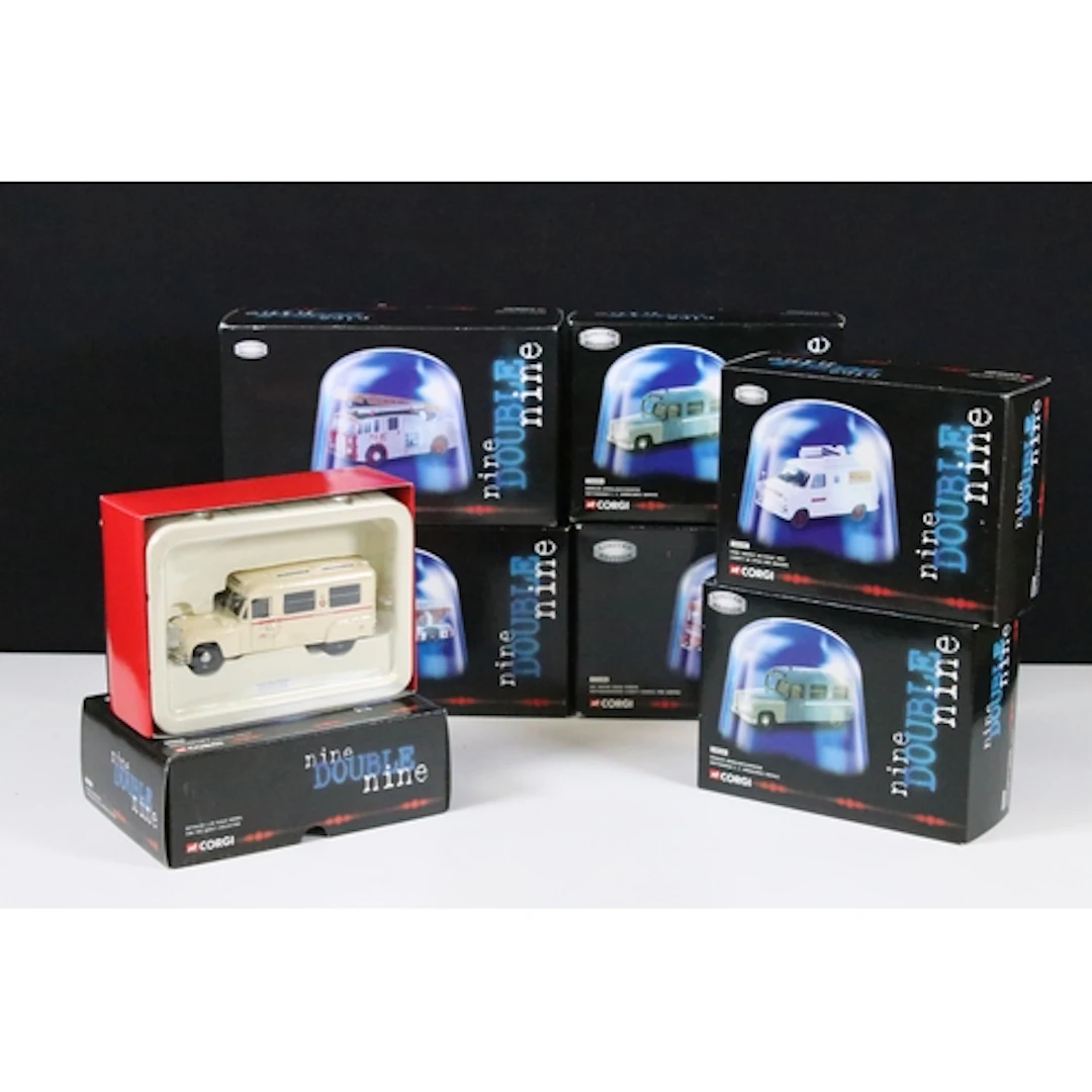 Seven boxed Corgi Nine Double Nine diecast models to include...