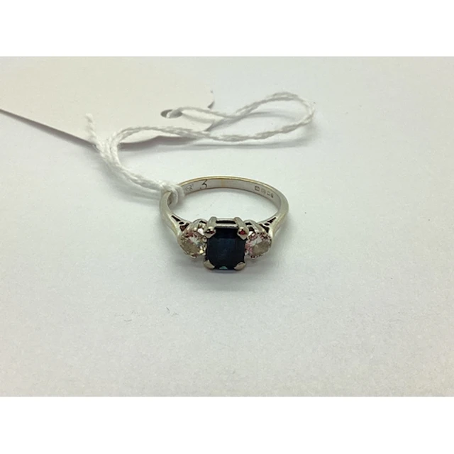 An 18ct White Gold Three Stone Ring, rectangular claw set ce...