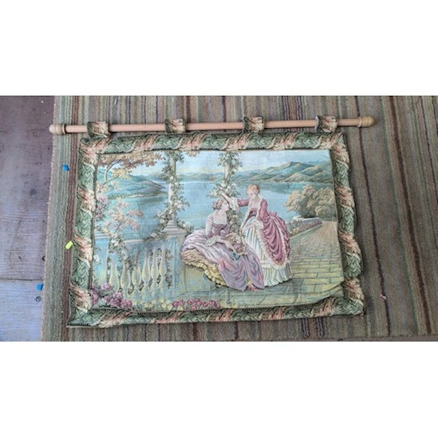 A framed decorative tapestry panel of Rococo taste, woven wi...