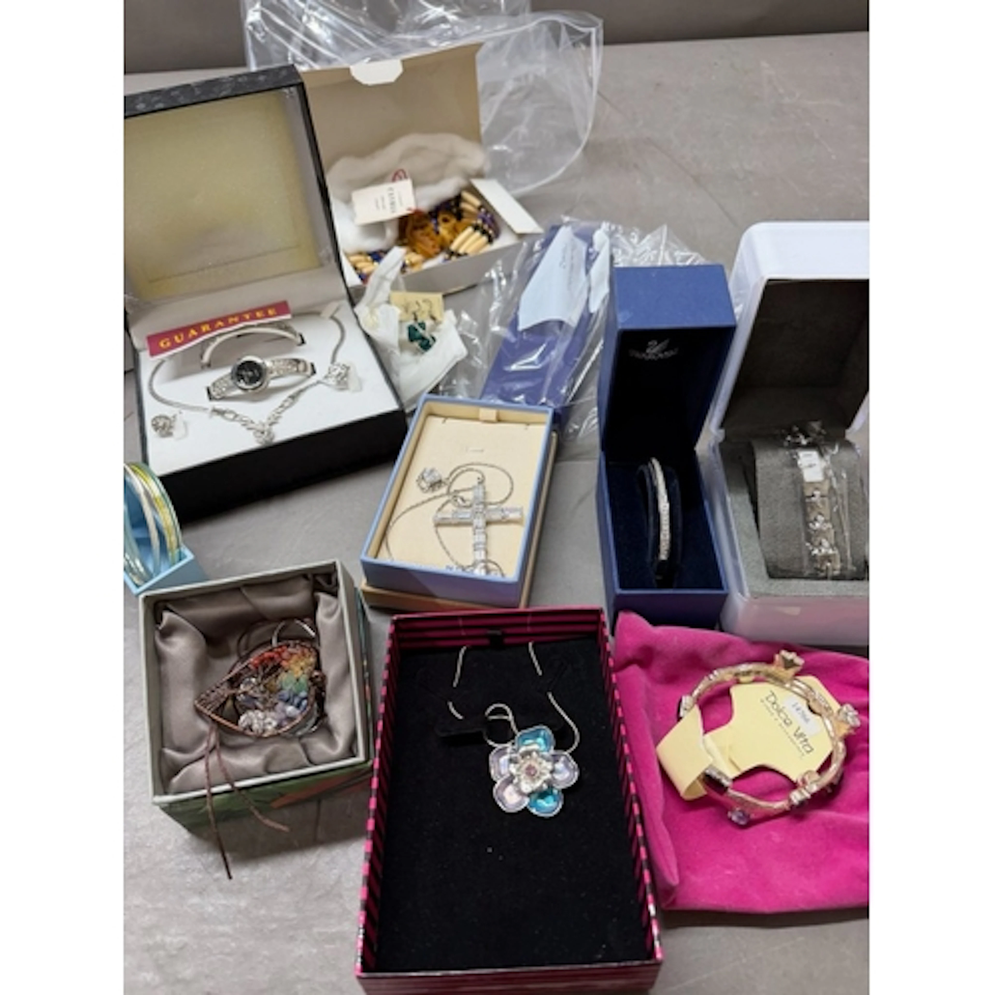A selection of quality boxed costume jewellery, various make...