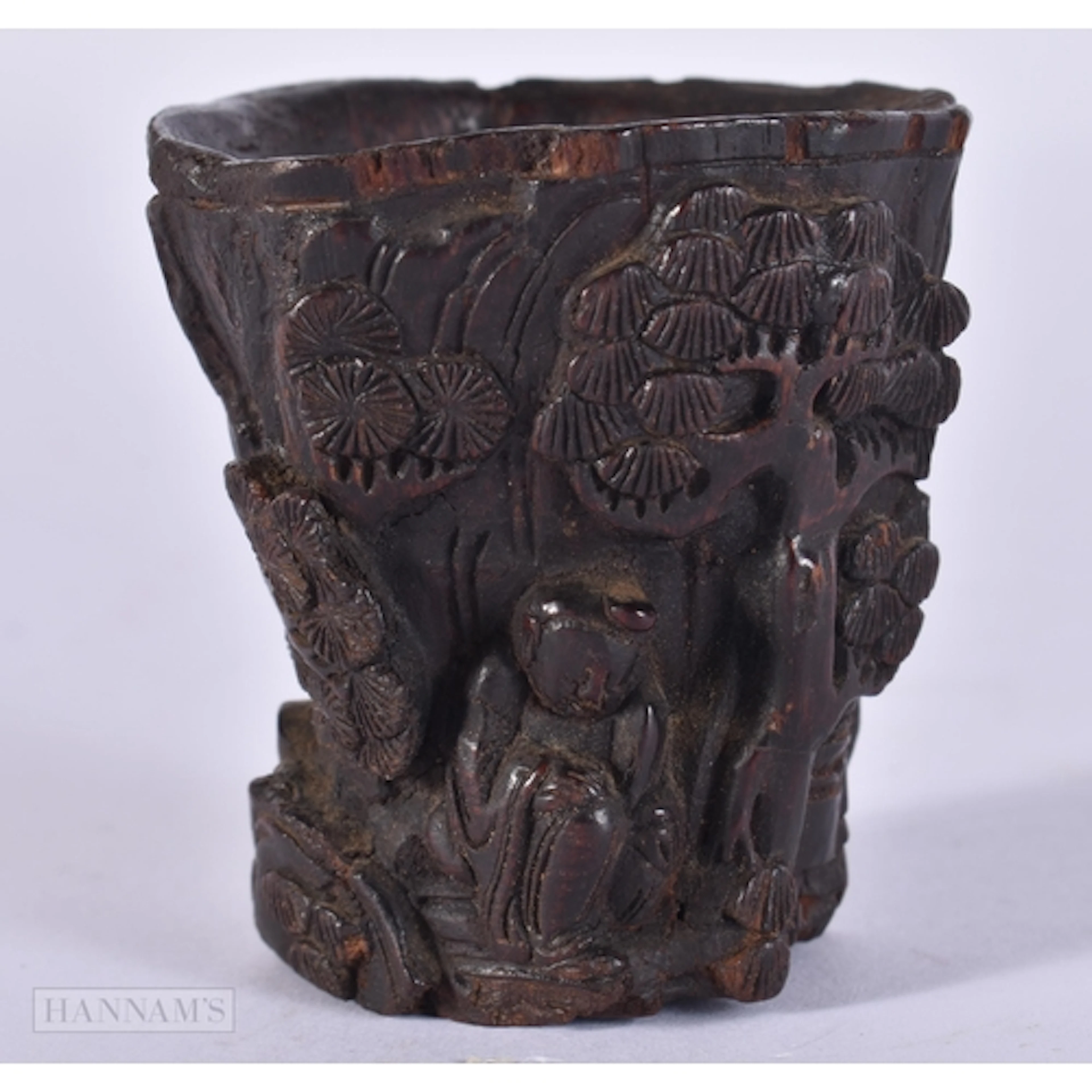 A FINE 17TH CENTURY CHINESE CARVED ALOESWOOD LIBATION CUP, M...