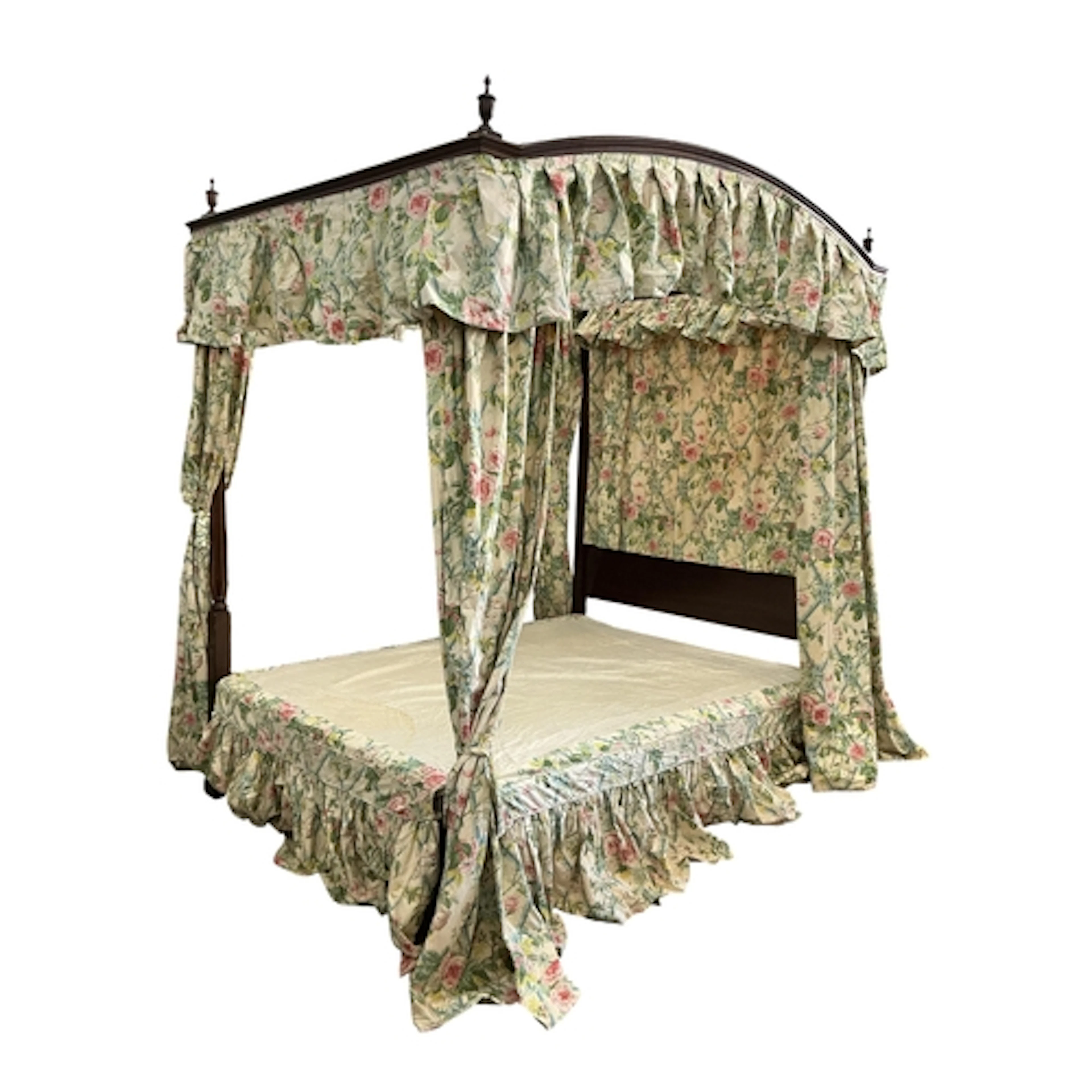 A George III style mahogany four poster bed, with floral dra...
