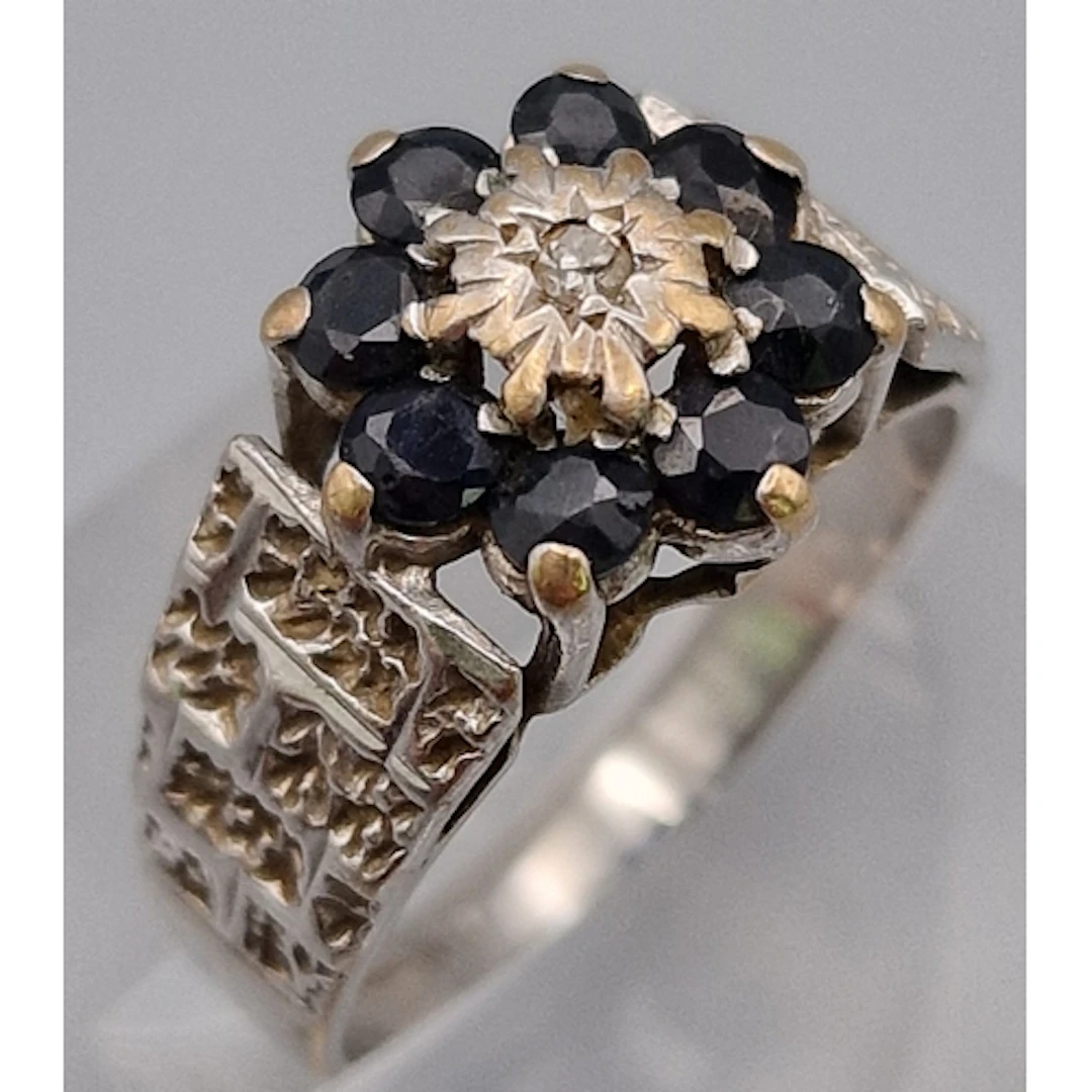 9ct white gold textured sapphire and diamond flowerhead ring...