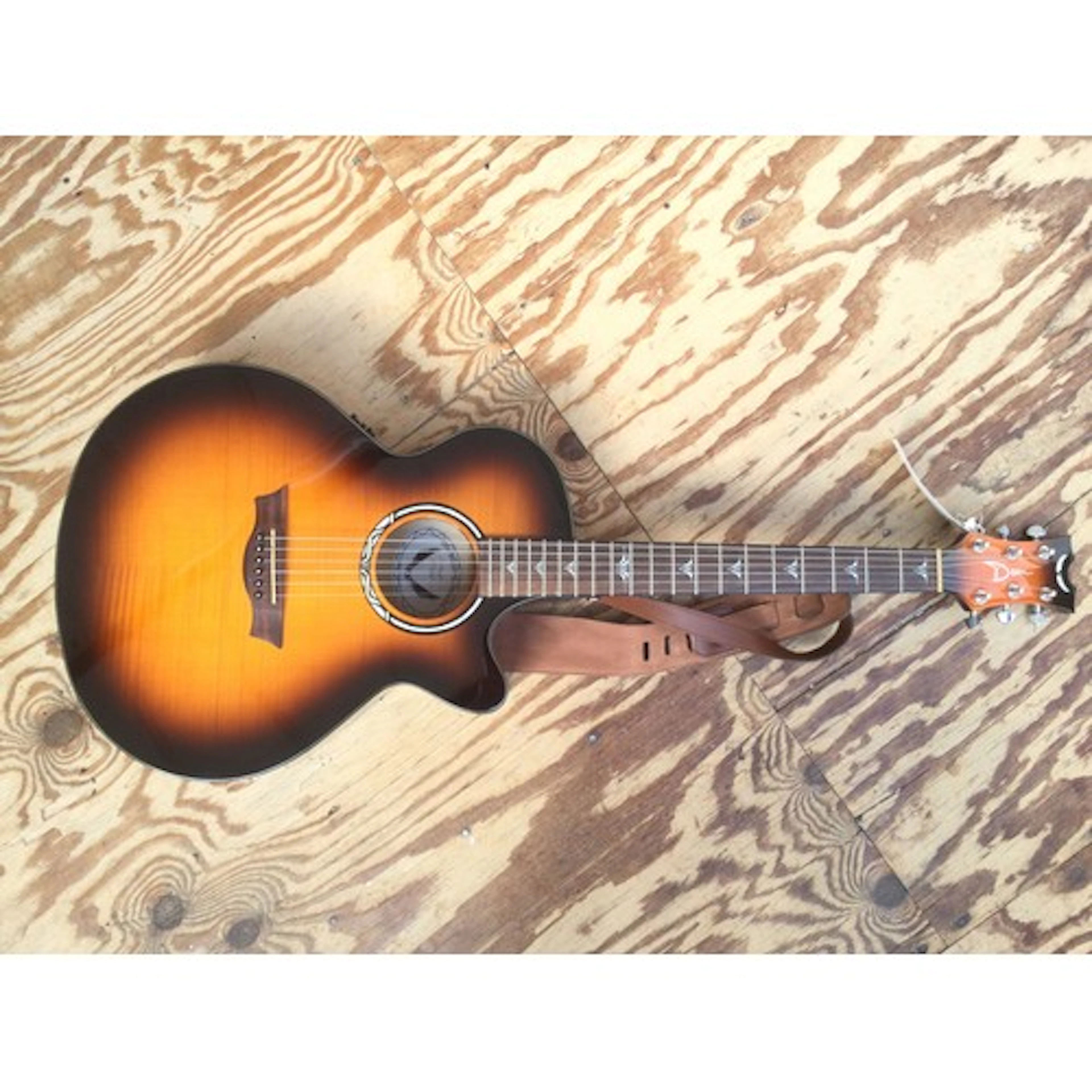 A Dean PE UFM TGE electro acoustic guitar. No case.