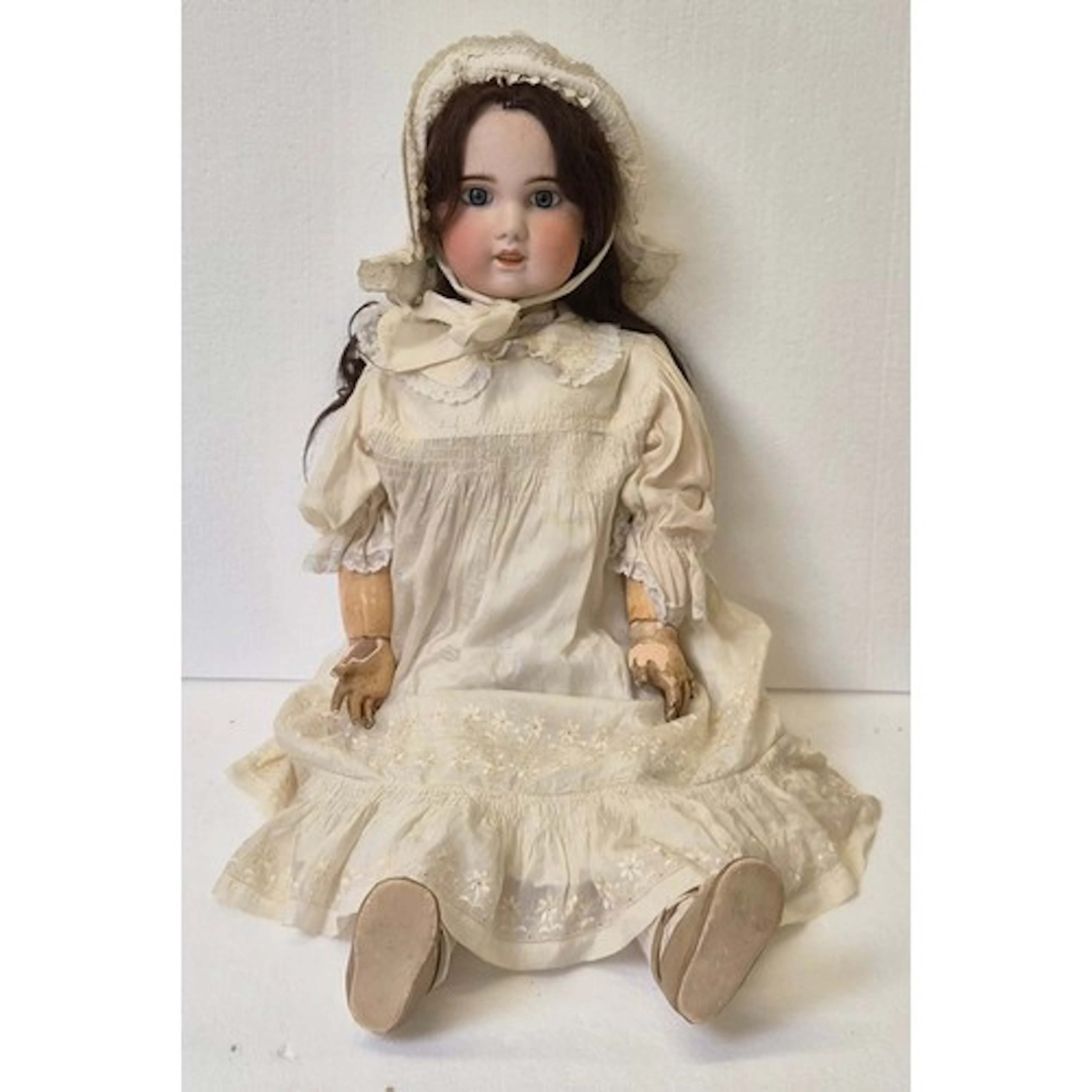A French bisque head doll, pierced ears, possibly Jumeau, wi...