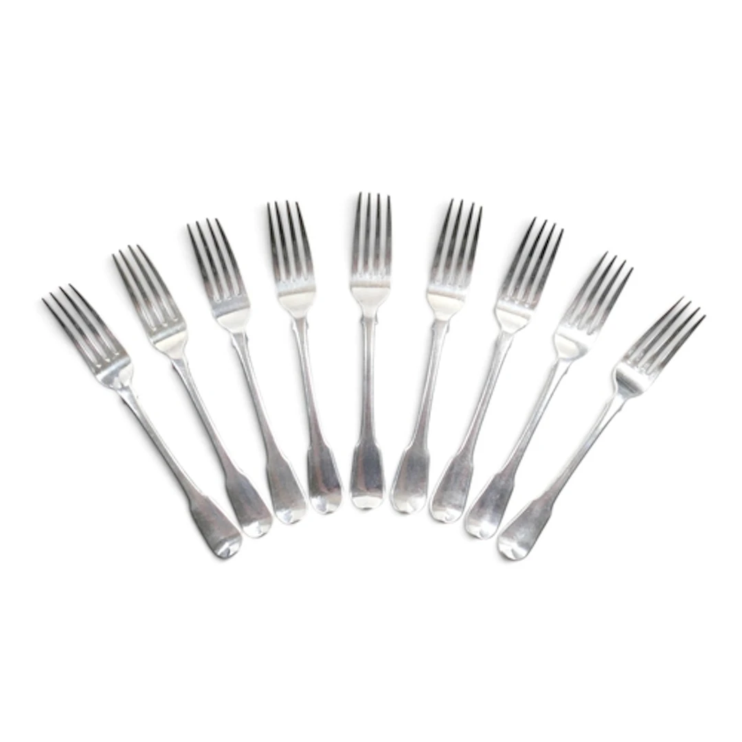 A SET OF NINE GEORGE III SILVER FORKS. Fiddle pattern, termi...