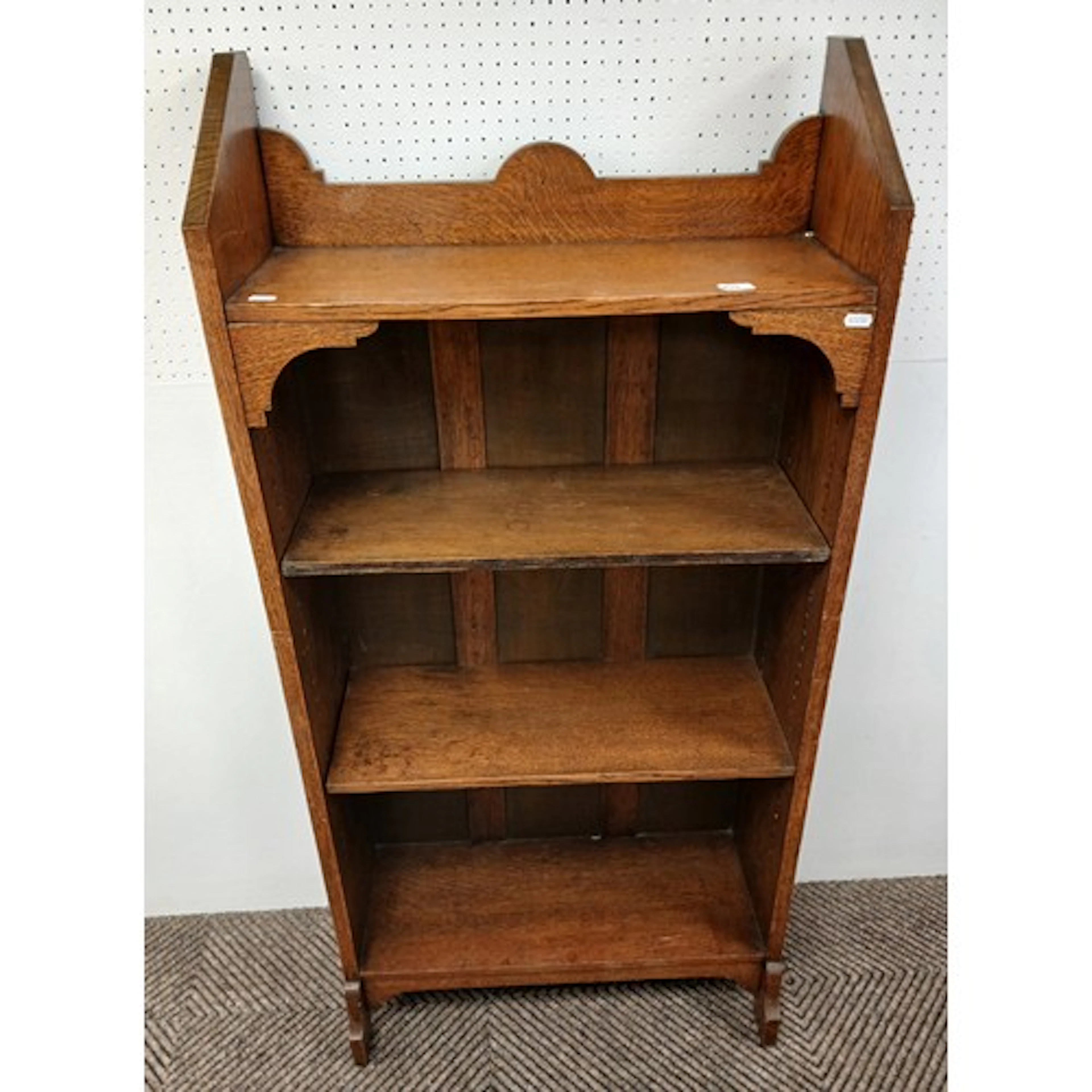 Oak three tier open book shelf, 66cm diameter.