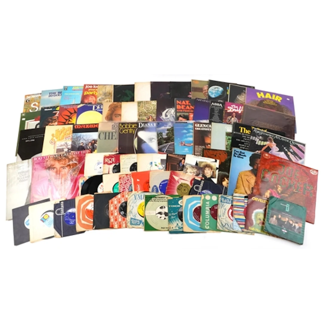 Group of vinyl LP and 45rpm records including Paul Simon, Bo...