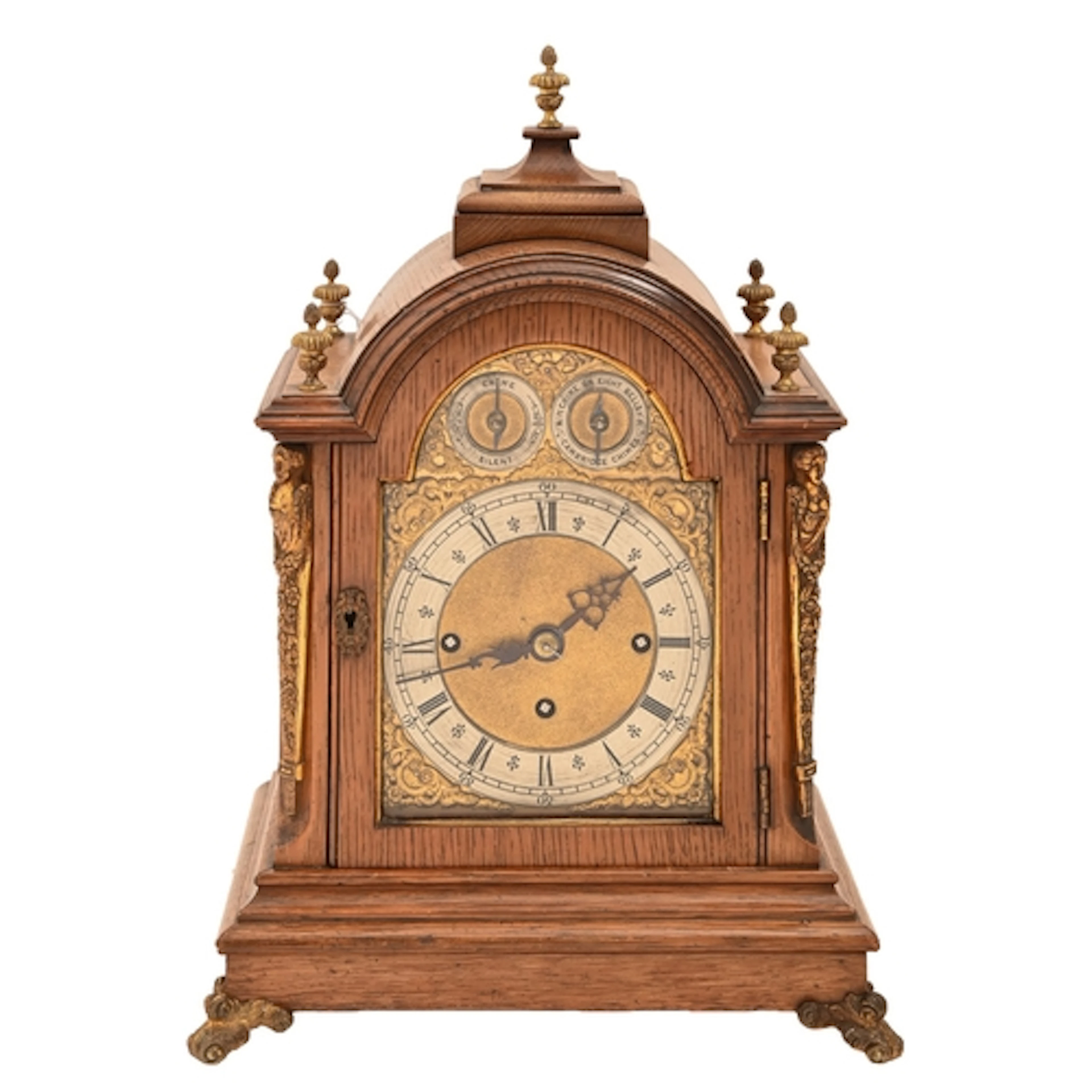A Victorian oak bracket clock, the break arched dial with ma...