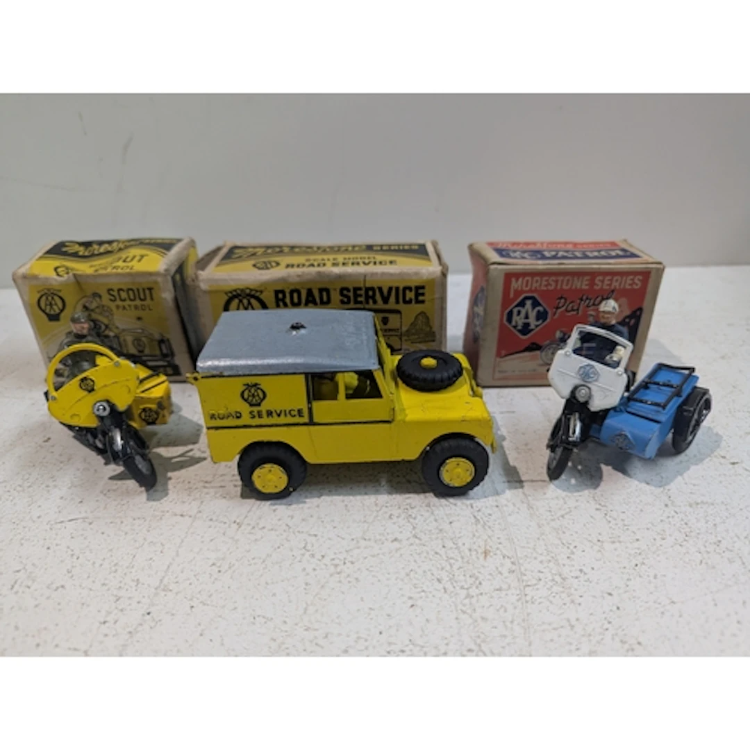 Three model vehicles to include a Scout patrol AA, an AA Lan...