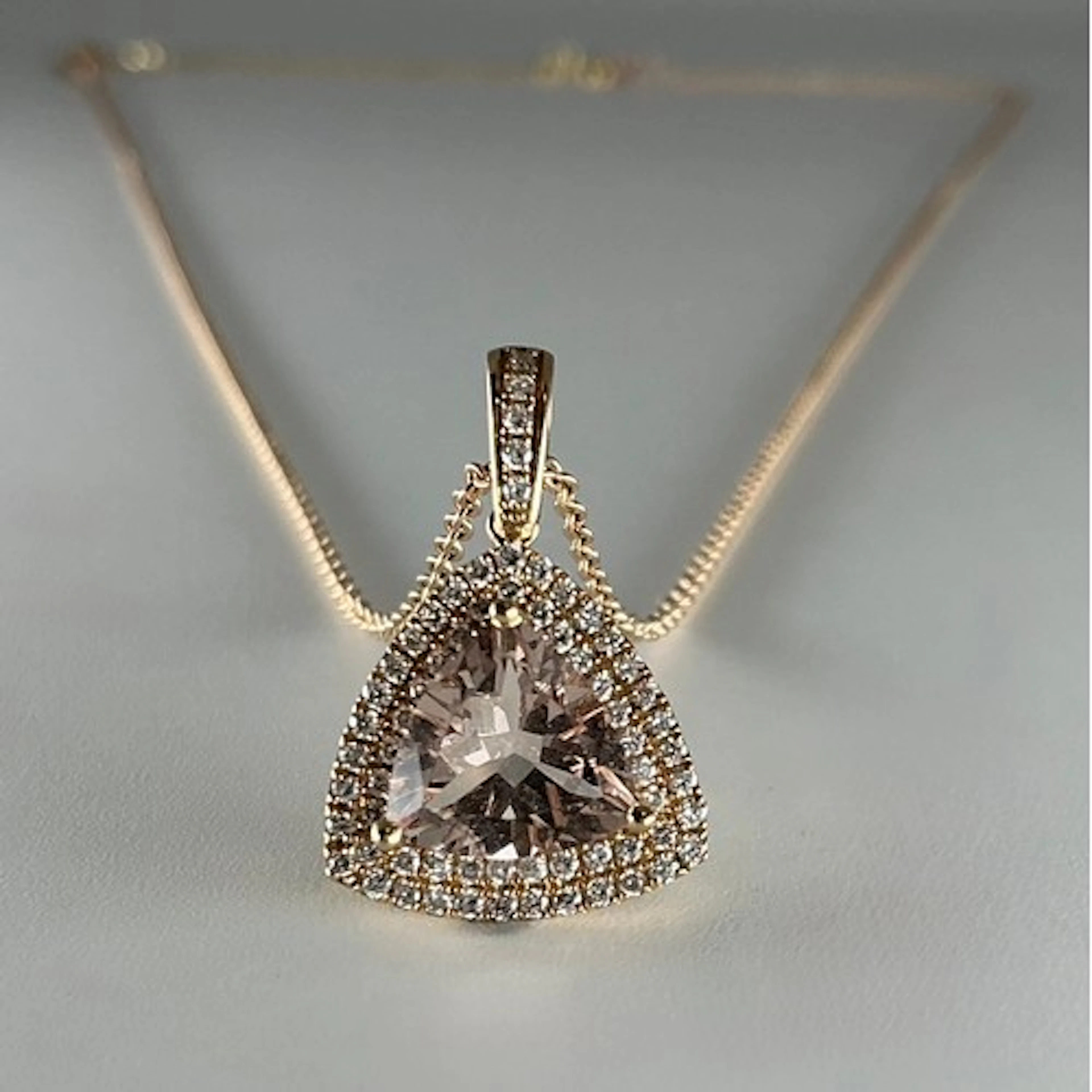 A Tivon London Morganite and diamond pendant, trilliant cut ...