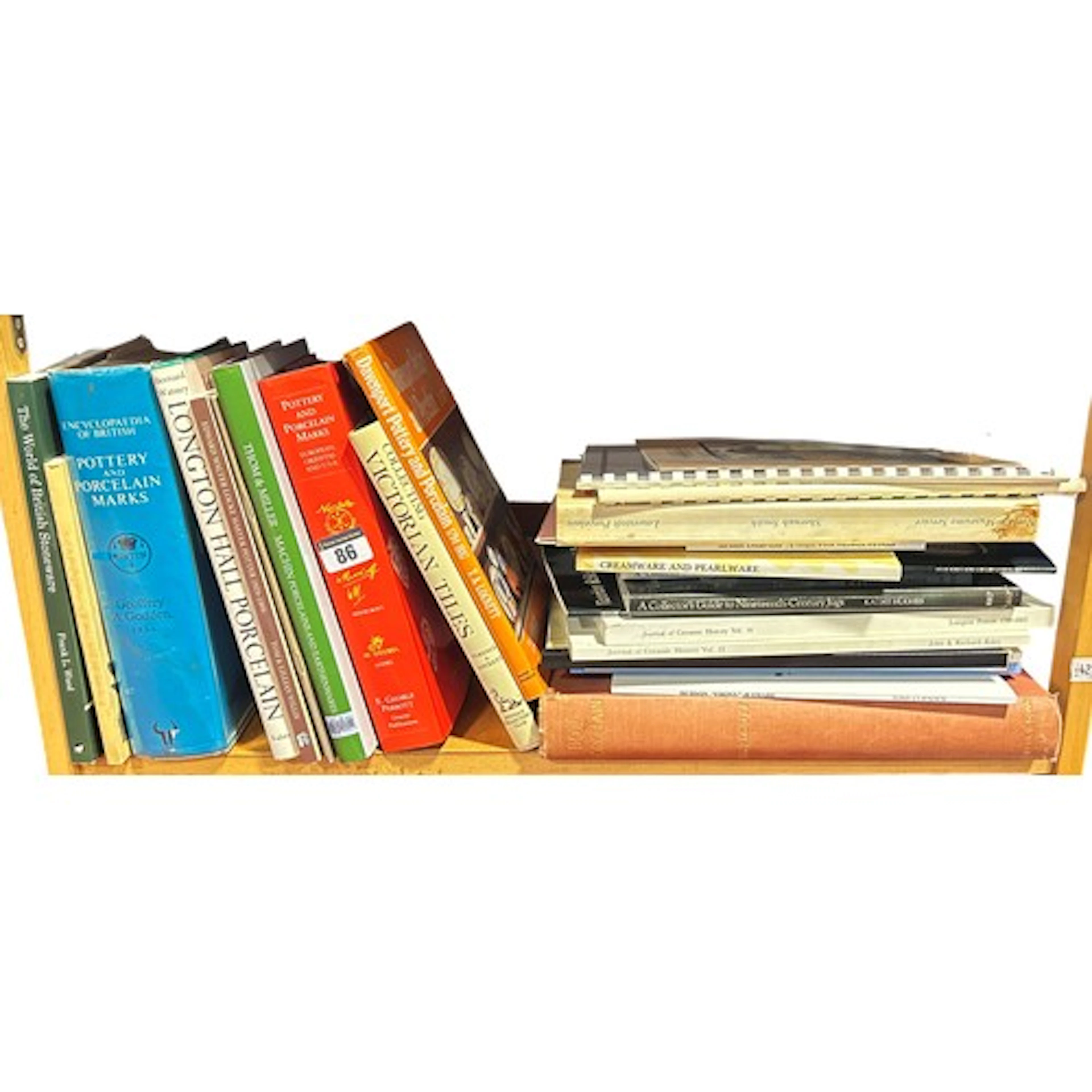A collection of books on ceramics and porcelain to include T...