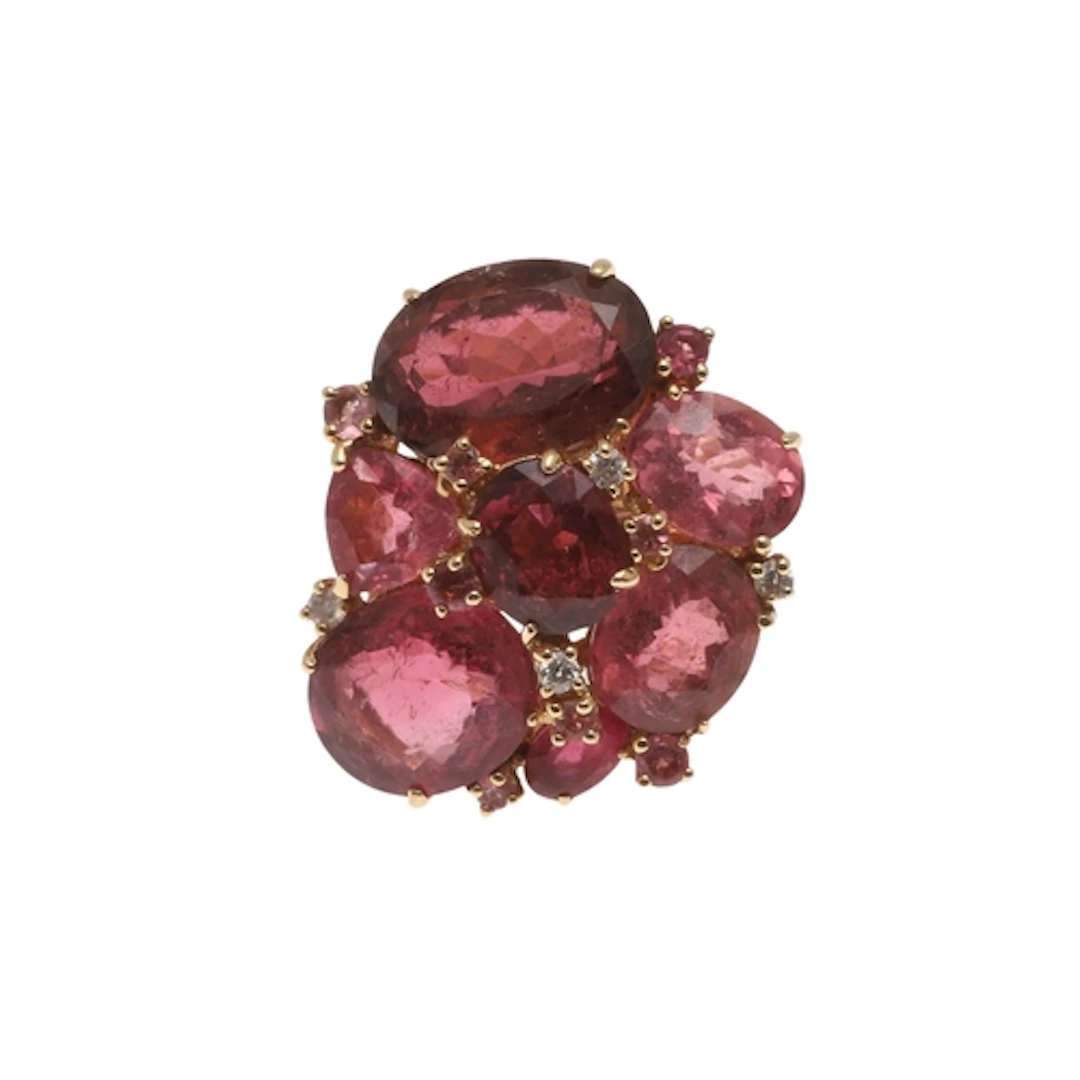 A PINK TOURMALINE AND DIAMOND CLUSTER RING BY TAYMA. mounted...