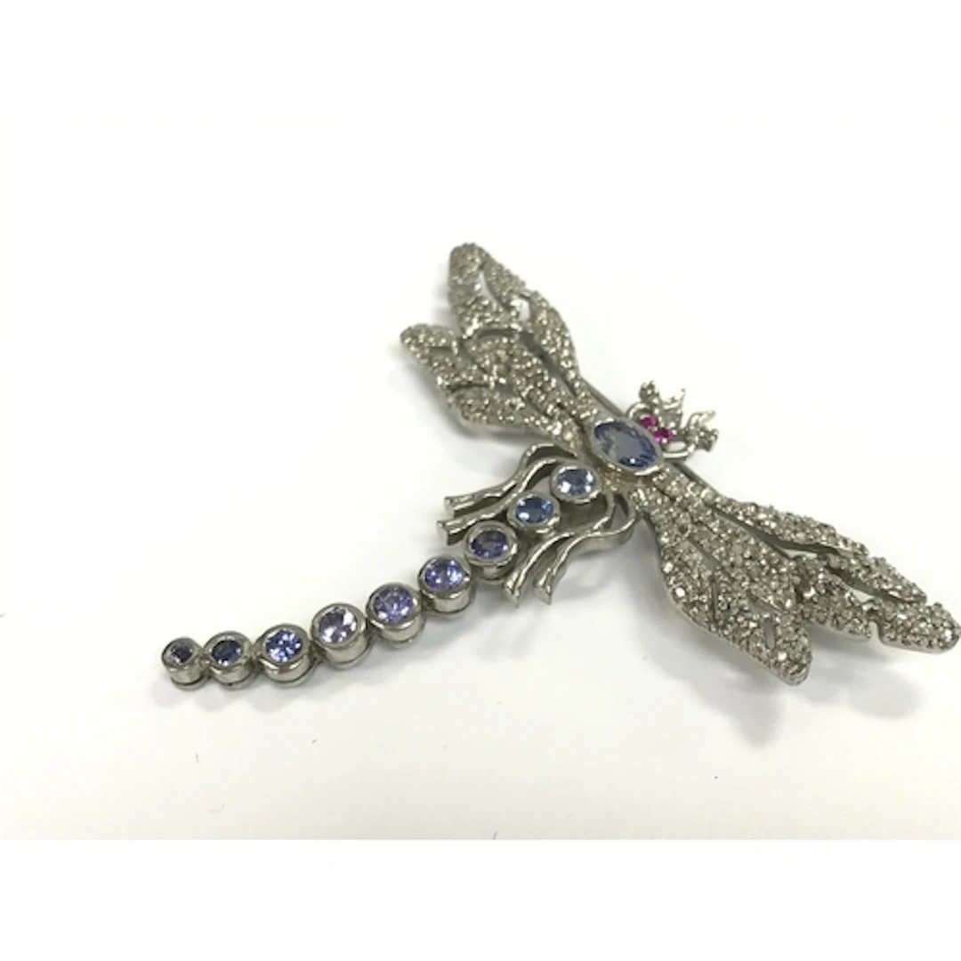 Silver dragonfly brooch/pendant set with tanzanite, rubies a...