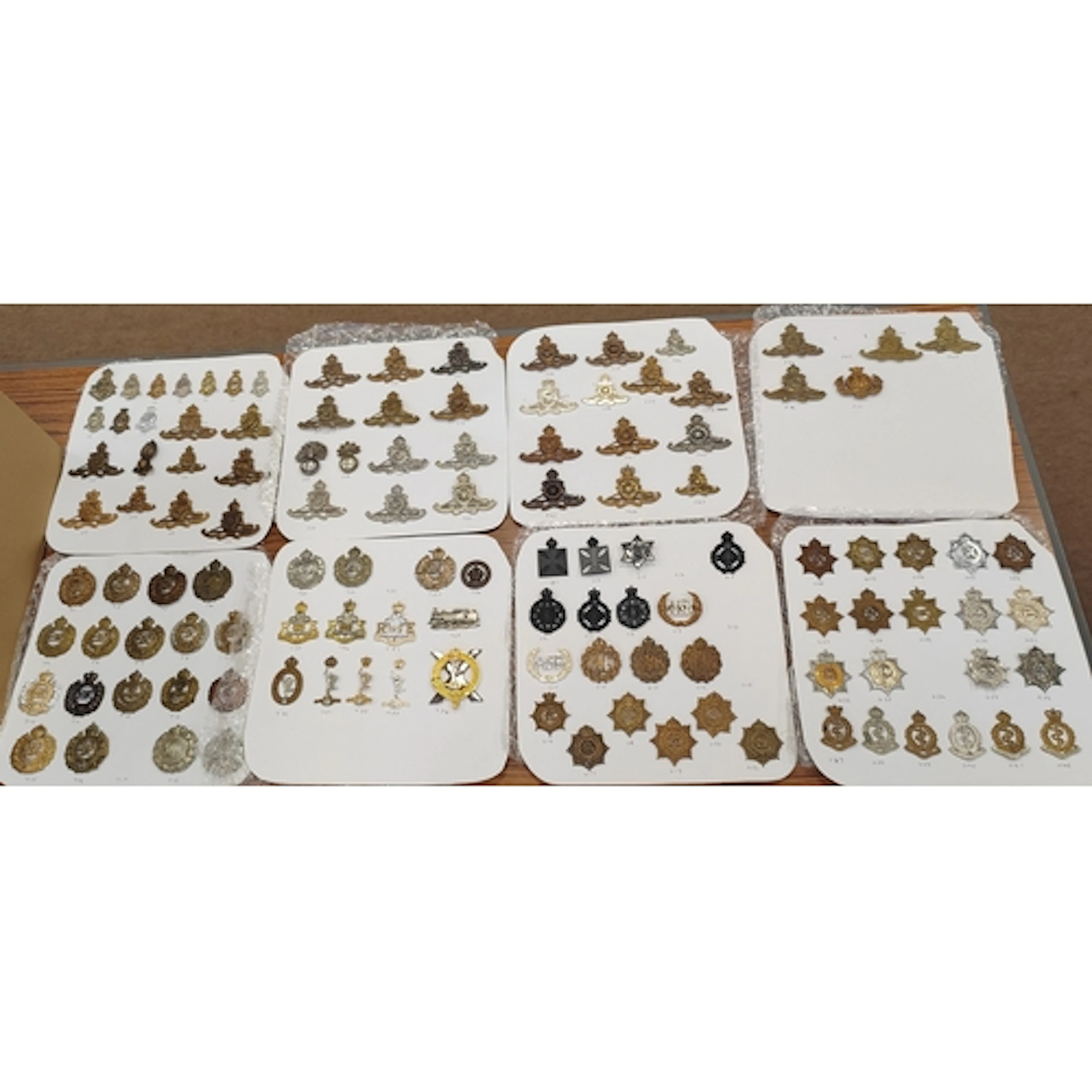 Collection of cap badges from various Royal Artillery, Royal...