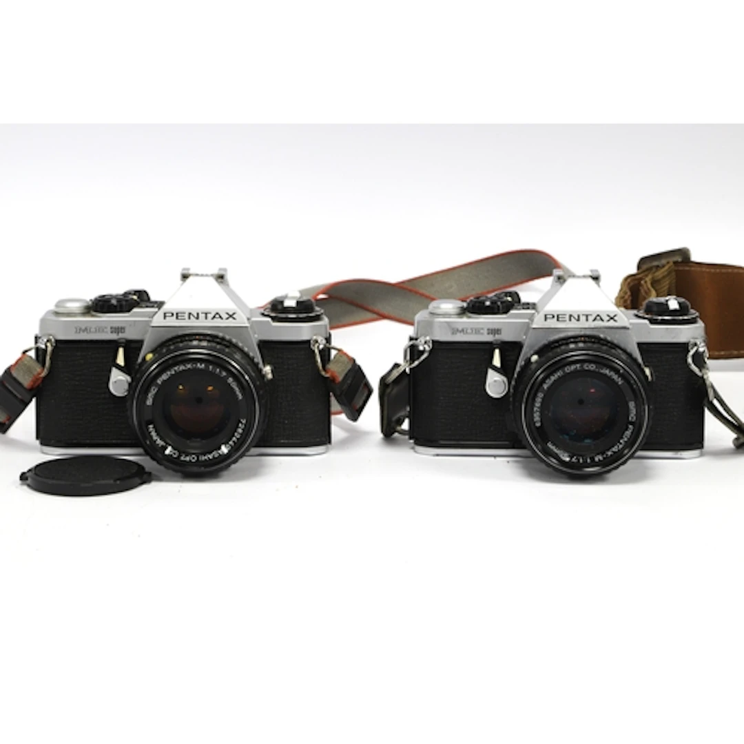 Pentax ME Super 35mm SLR Film Camera with attached SMC Penta...